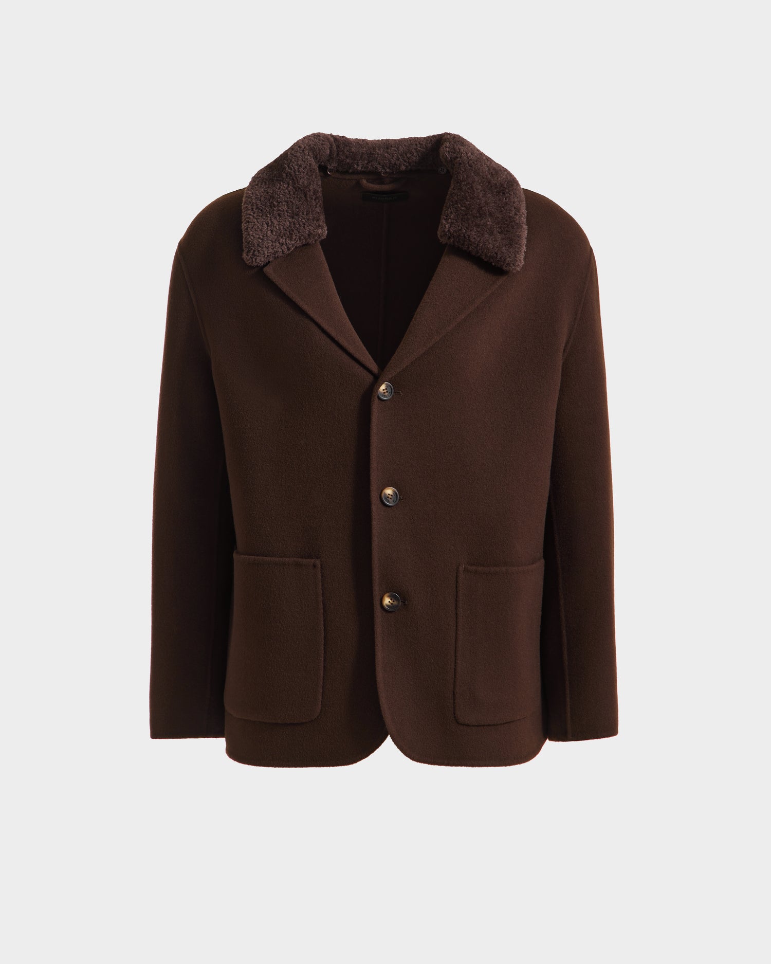 The Rudsak AIDEN - 6125558 Espresso is a dark brown mens wool-blend coat featuring a removable faux shearling collar, three front buttons, and two large front pockets, shown on a plain white background.