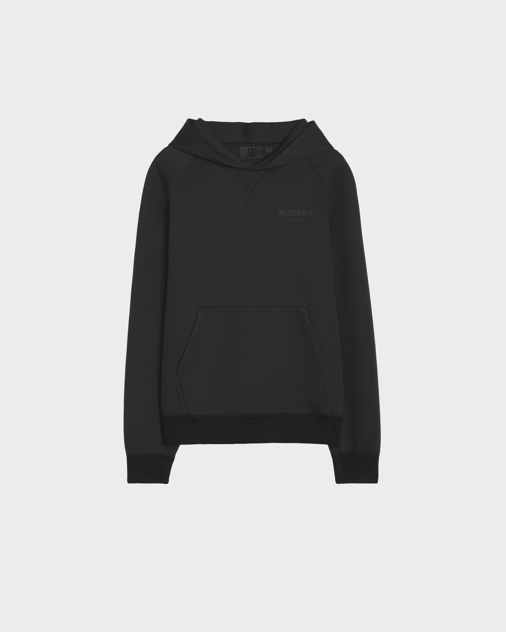 The Rudsak BARRY - 9524011 Black M hoodie features long sleeves, a front kangaroo pocket, and subtle branding on the left chest, shown against a white background.