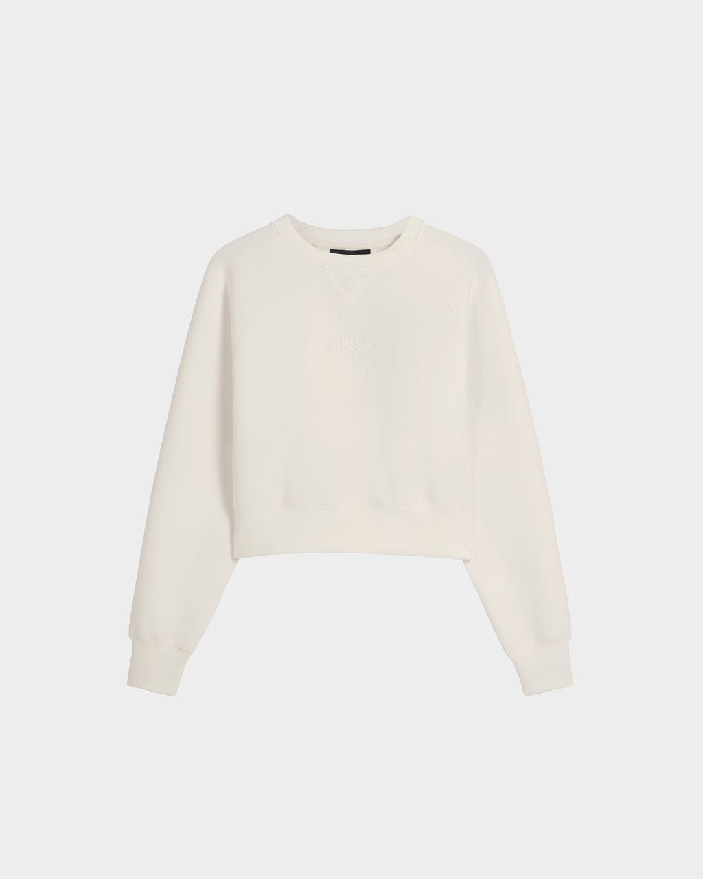 The BETSY - 8525087 Iceland by Rudsak is a women's premium cotton blend crop sweater with long sleeves, ribbed cuffs and hem, and a crewneck style, shown on a plain white background.