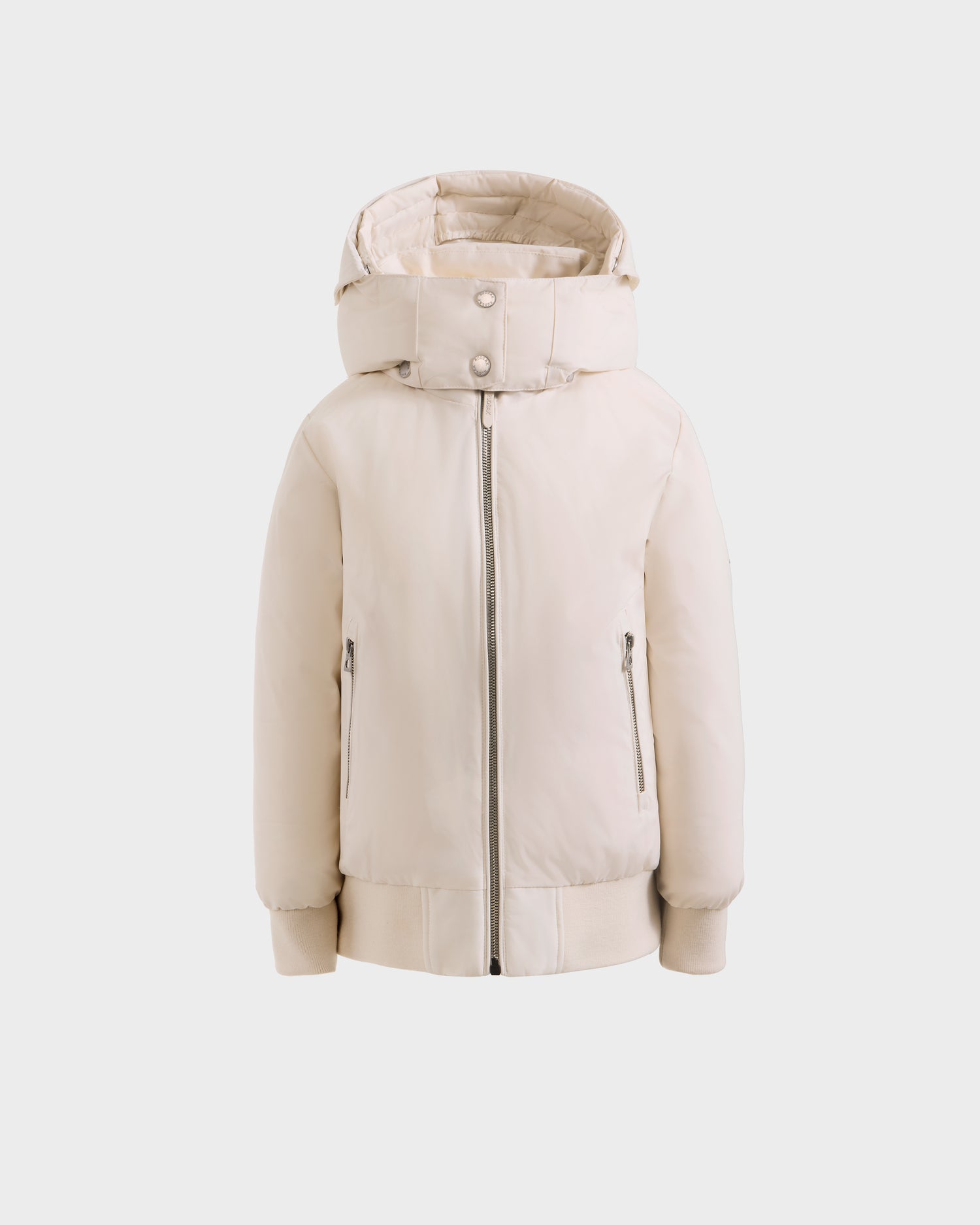 The BOOKER K - 0124500 Vanilla by Rudsak is a cream-colored kids' quilted puffer jacket featuring a high collar, front zipper, snap buttons, side zip pockets, and ribbed cuffs, shown against a plain white background.