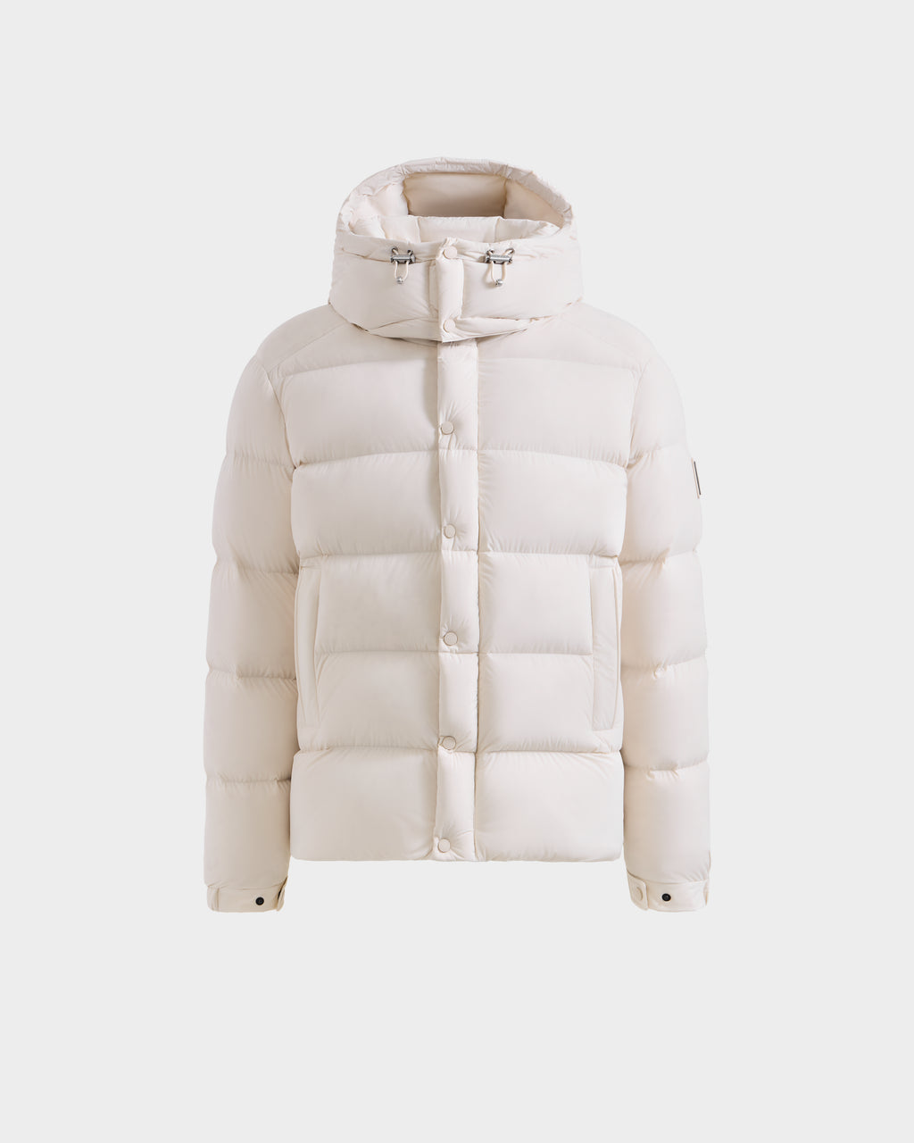 A front view of the Rudsak BRAYDEN M-S - M125524 Vanilla men’s down puffer jacket in white, featuring a hood, snap buttons, and drawstring details, displayed on a plain white background.