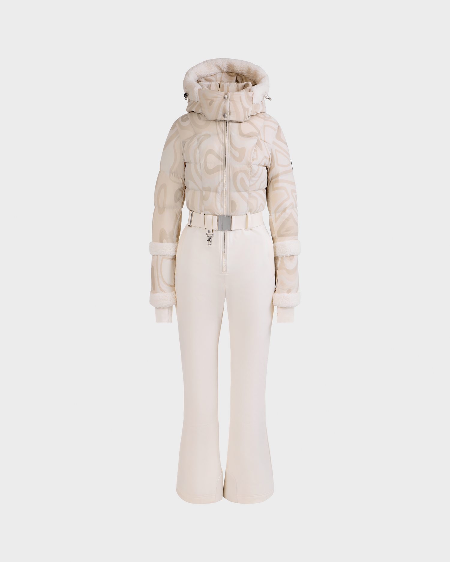 A mannequin showcases Rudsak's CARMEN P - 8125707 Vanilla Deja vu: a cream-colored belted puffer jacket with a subtle swirl pattern and matching high-waisted pants, perfect for ski or cold weather wear.