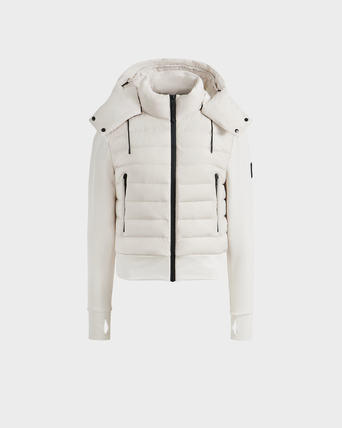 The Rudsak CASSA - 8125057 Vanilla is a lightweight white cropped puffer jacket with a hood, black zipper, quilted front, long sleeves, and thumb holes. Ideal as a womens transitional piece, shown on a plain light background.