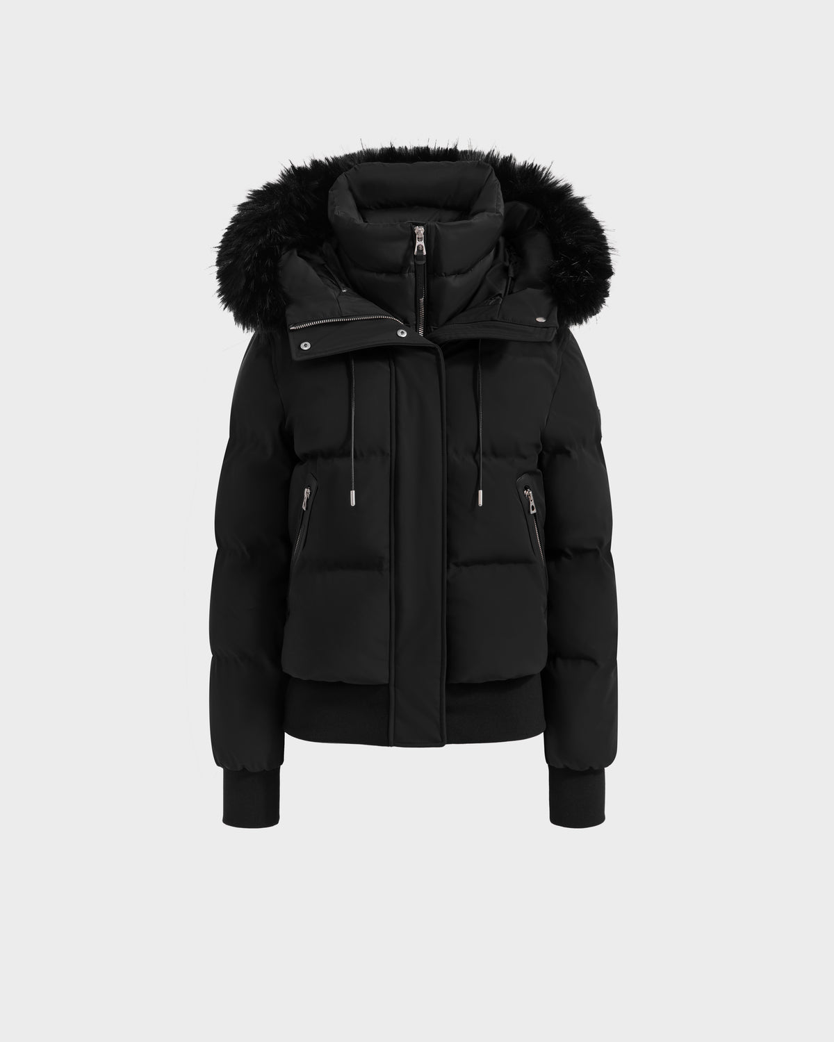Rudsak CIEYNA - 8125579 Black: A black down-filled bomber jacket featuring a front zipper, two large pockets, ribbed cuffs, and a detachable faux fur hood in recycled weather-resistant shell. Shown on a plain light grey background.