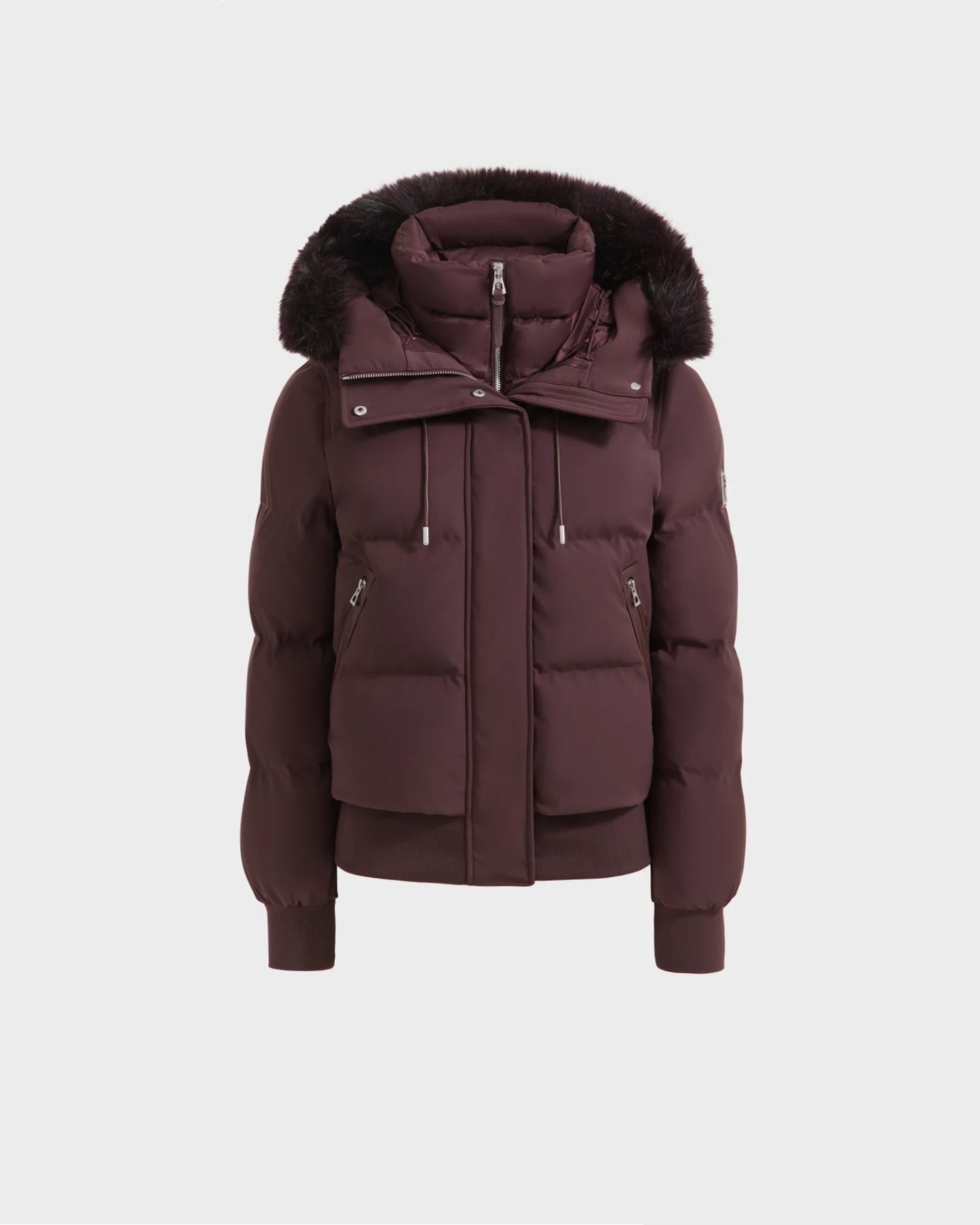 The Rudsak CIEYNA - 8125579 Bordeaux is a winter bomber jacket with a hood and weather-resistant shell, ideal for staying warm and protected on chilly days.