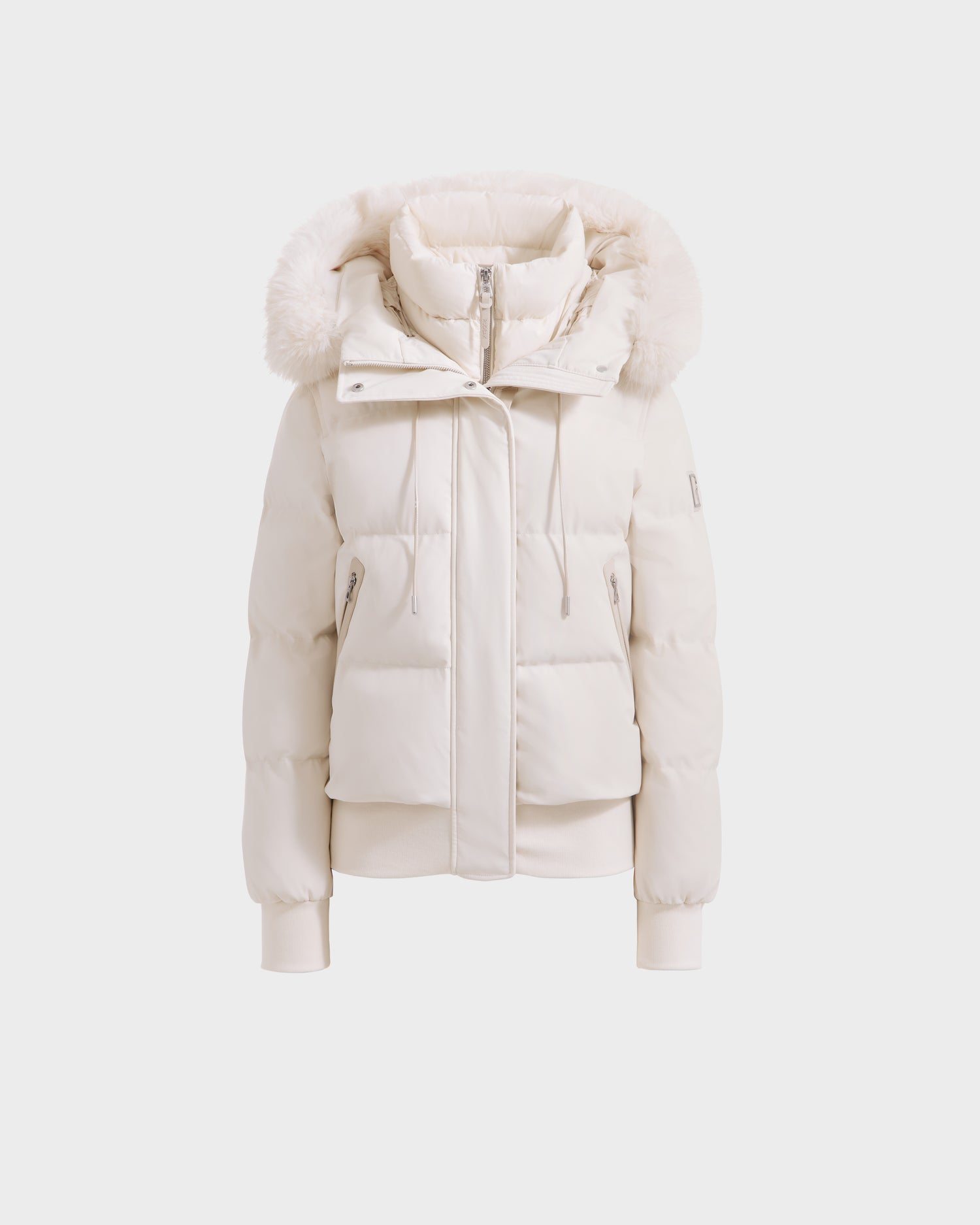 The Rudsak CIEYNA - 8125579 Vanilla is a white down-filled bomber jacket with a recycled weather-resistant shell, front zipper, large pockets, ribbed cuffs and hem, and a faux fur hood, shown on a plain white background.