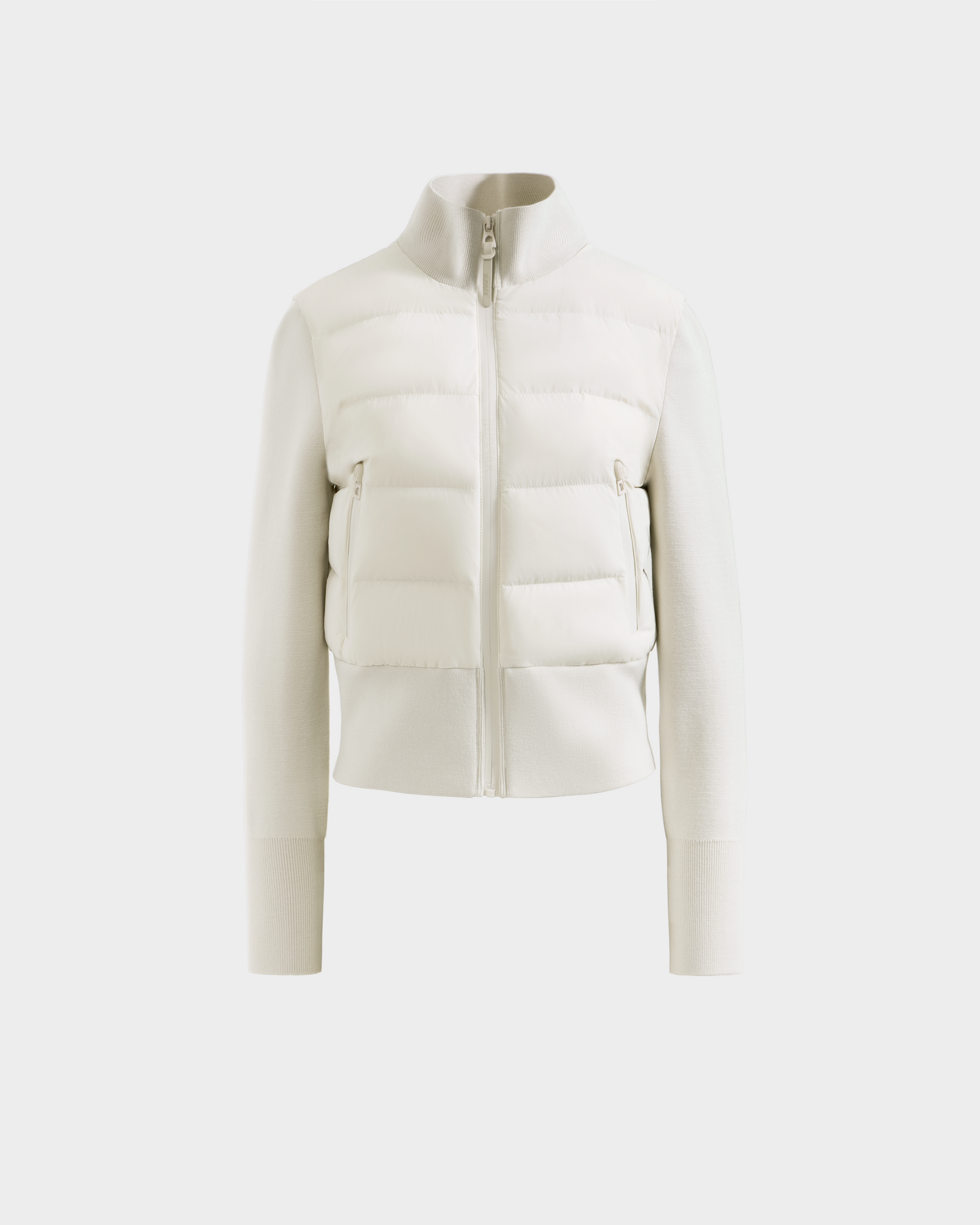 Front view of the Rudsak CLAREMONT - 8125502 Vanilla women’s short down jacket in white, with a zip-up front, high collar, and ribbed knit sleeves and hem, shown on a plain light background.