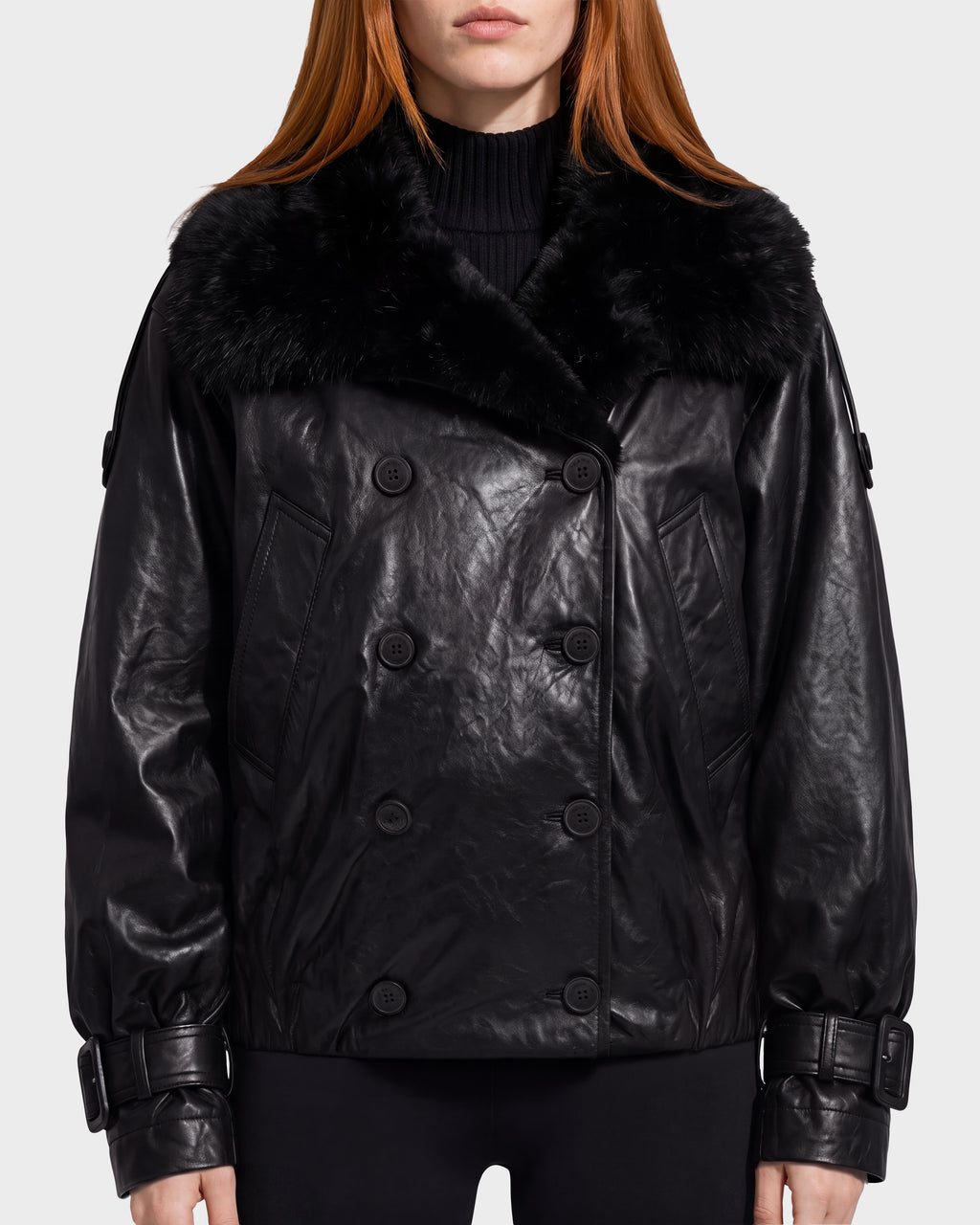Rudsak JANELLE - 8126936 Black leather bomber featuring a faux fur collar, modern silhouette, button closures, and a double-breasted design.