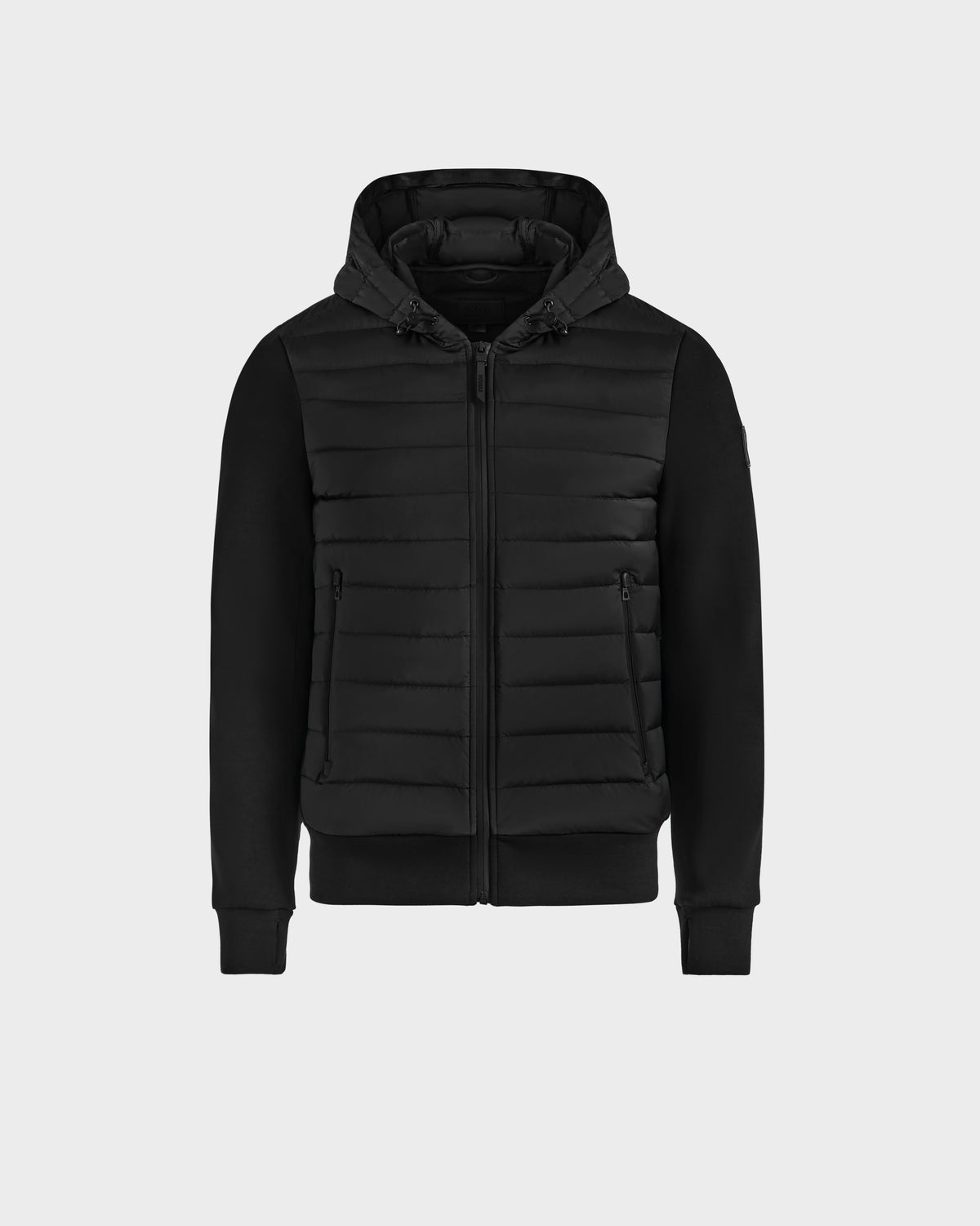 The DEE MAT - 6124028 Black by Rudsak is a mens lightweight hybrid down jacket with quilted panels, smooth sleeves, front zipper, two zippered side pockets, and an adjustable hood.