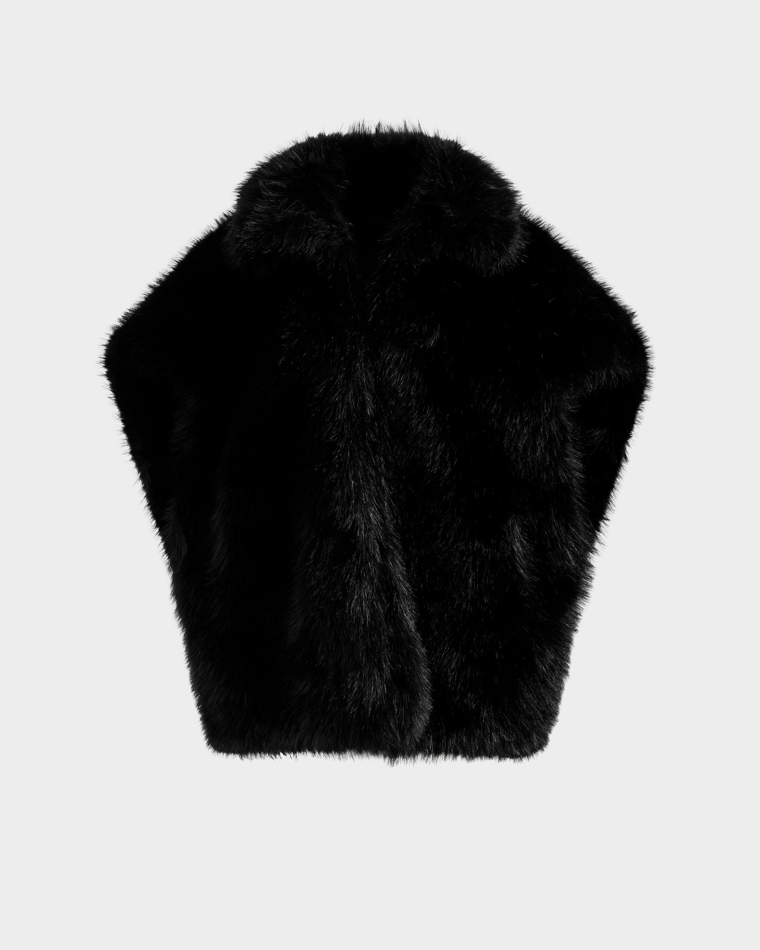 The DELFINA - 8525662 Black by Rudsak is a black faux fur vest with a soft, plush texture and a wide, rounded shape, shown on a light gray background. This buttonless vest is ideal for winter or transitional outfits.