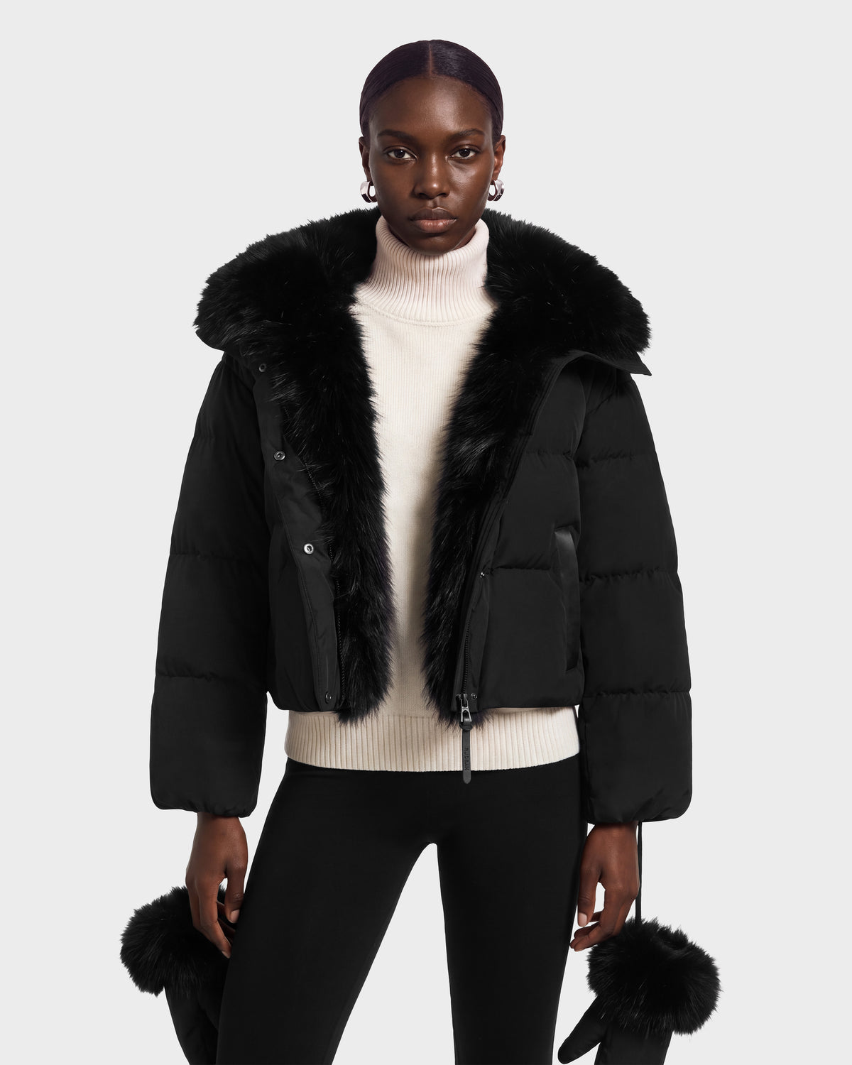 ALONDRA - 8126992 Black cropped puffer jacket with a black faux fur collar and matching faux fur cuffs.