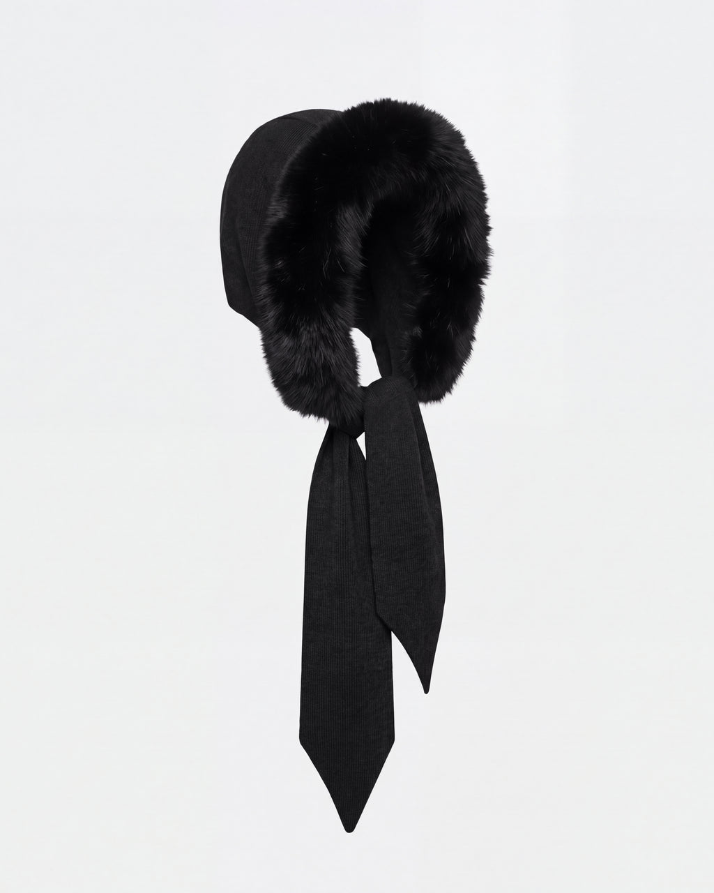 The KARYMA - 8426507 Black by Rudsak is a black winter hood-and-scarf hybrid featuring a thick, plush fur trim and two long fabric ties, shown against a plain white background.