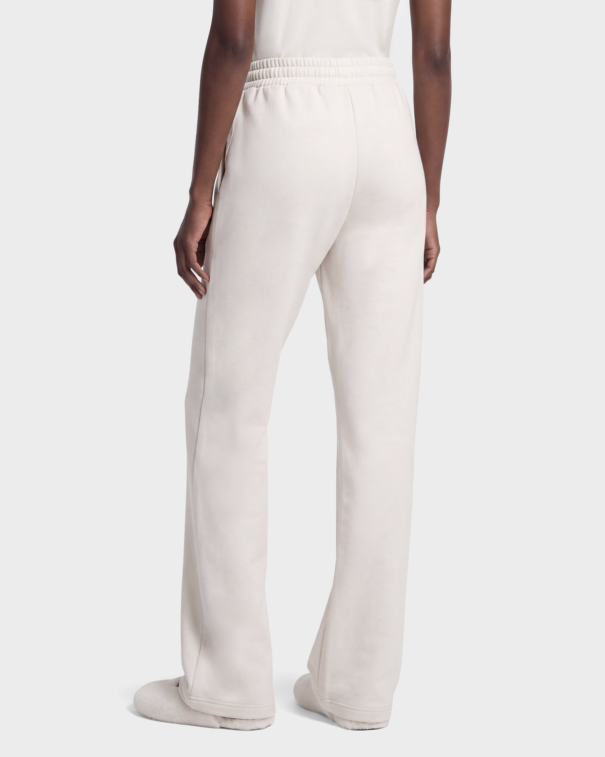 Back view of vanilla-colored stretch cotton Rudsak ANGEL - 8526725 sweatpants with an elastic waistband for a refined off-duty look.