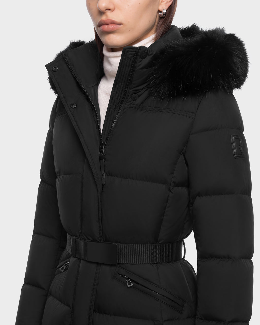 Rudsak GRACE FF - 8126535 Black puffer coat with a fur-trimmed hood and a buckled waist belt.