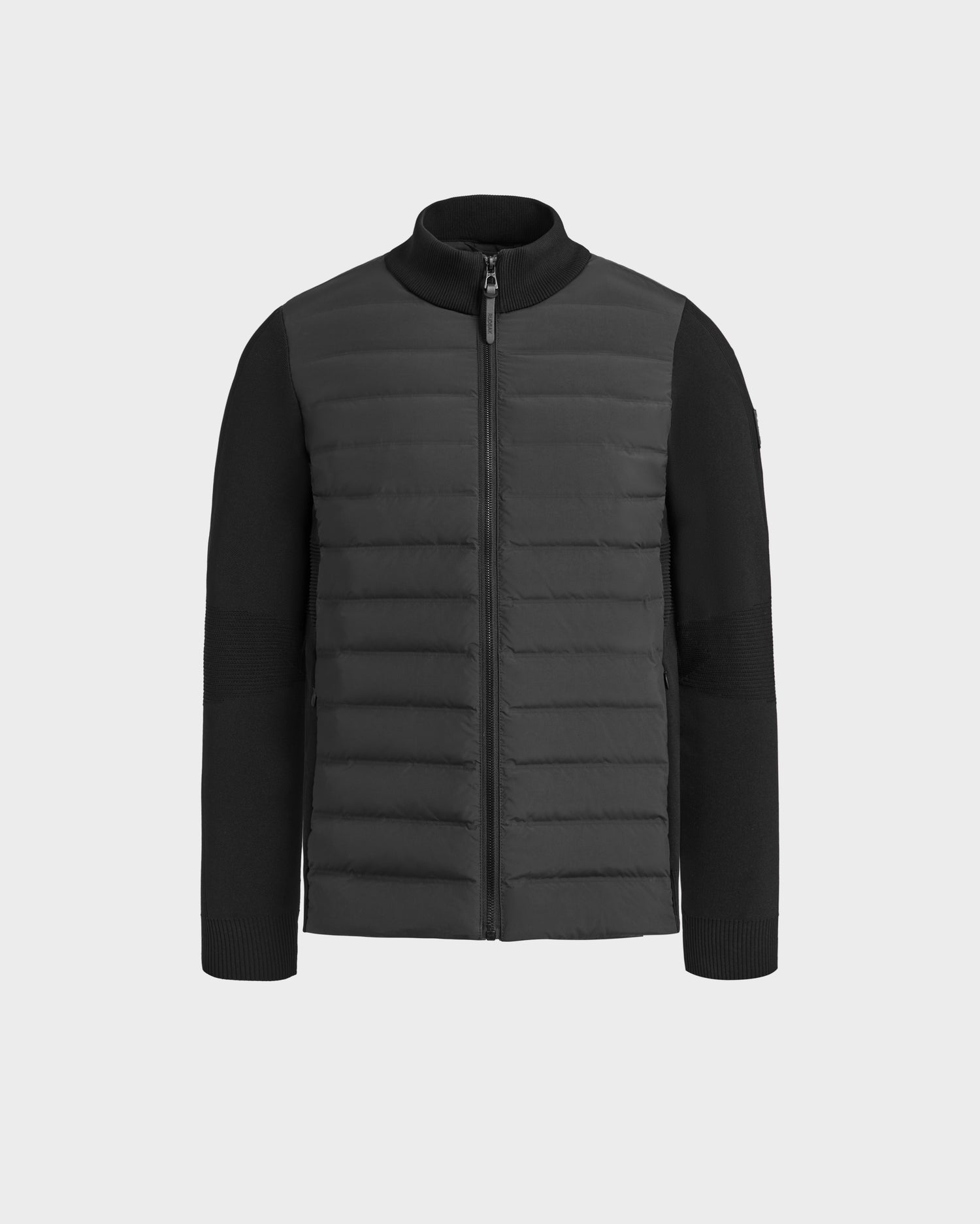 The Rudsak EMMETT - 6125029 Black is a black mock-neck hybrid jacket with lightweight down insulation, quilted front padding, and plain sleeves and sides—an essential for the modern mens wardrobe, shown against a white background.