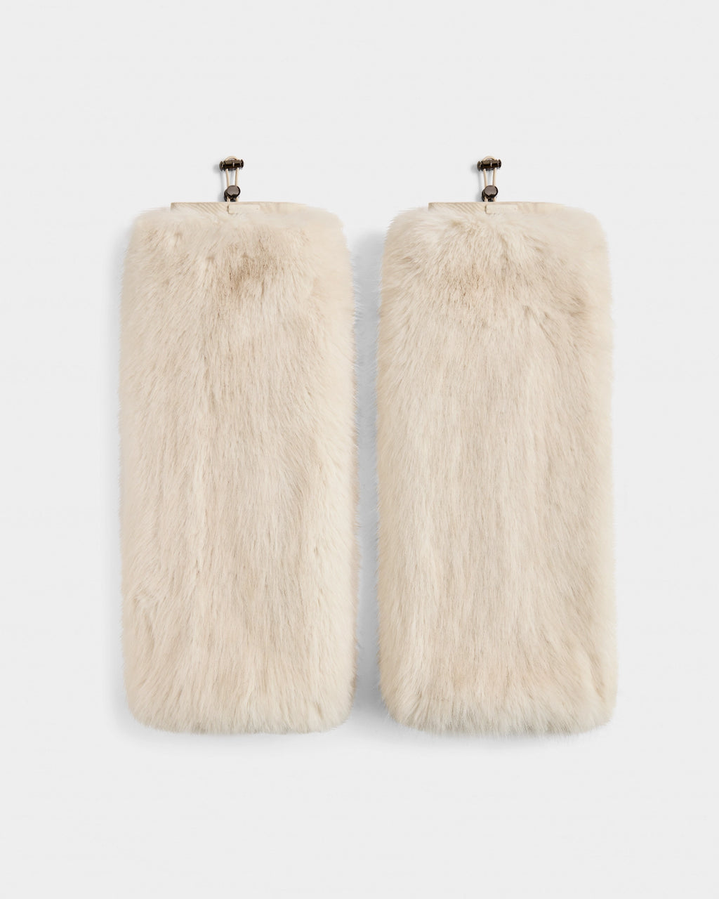 Two PAIGE - 8425534 Vanilla rectangular faux fur clutches by Rudsak, in cream with metal clasp closures, are displayed side by side on a white background—the ideal women’s winter accessory for après-ski chic.