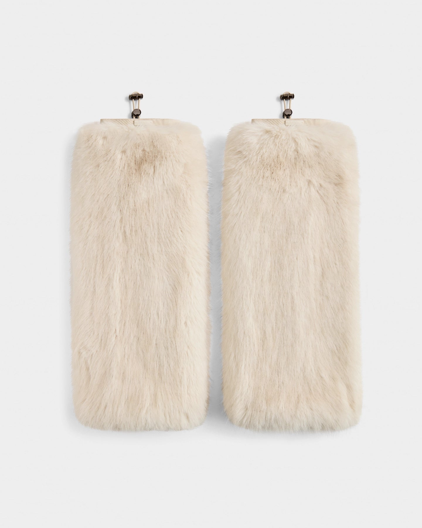 Two PAIGE - 8425534 Vanilla rectangular faux fur clutches by Rudsak, in cream with metal clasp closures, are displayed side by side on a white background—the ideal women’s winter accessory for après-ski chic.