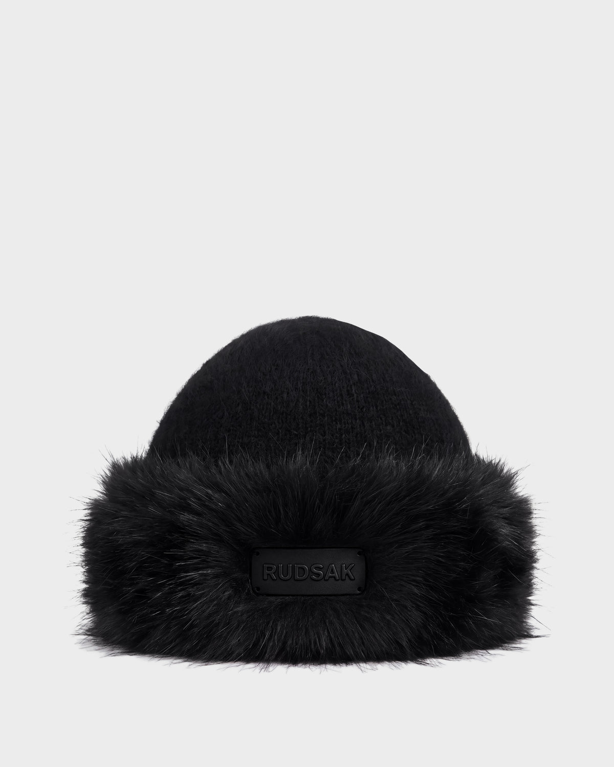 Black knit LORETTA W - 8426510 Black beanie with a thick faux fur brim and a branded rectangular patch.