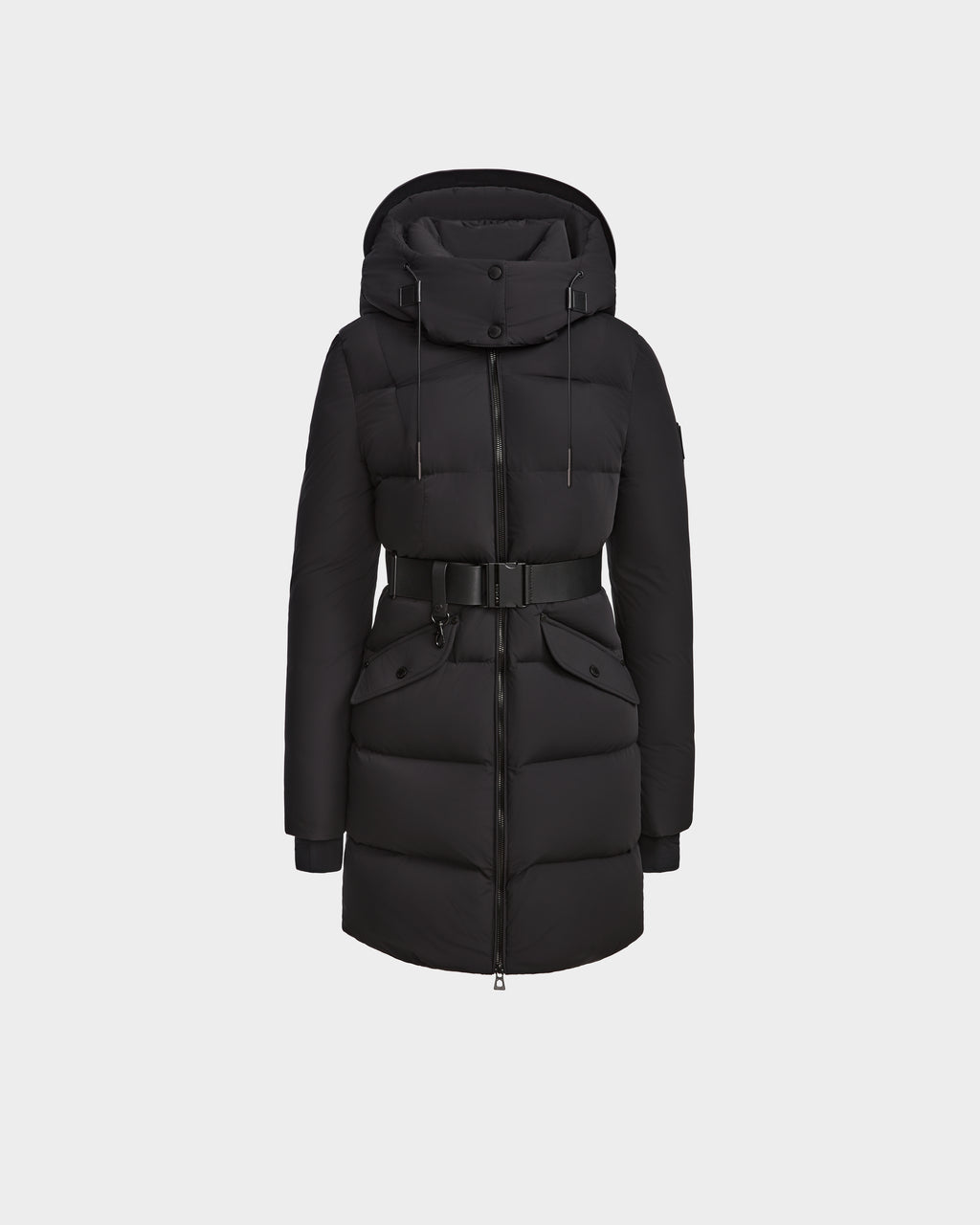 The Rudsak CAT - 8124584 Black is a mid-length women’s quilted down puffer coat with hood, front zipper, snaps, large pockets, belted waist, ribbed cuffs, and adjustable drawstring. Filled with RDS-certified down. Shown on plain white background.