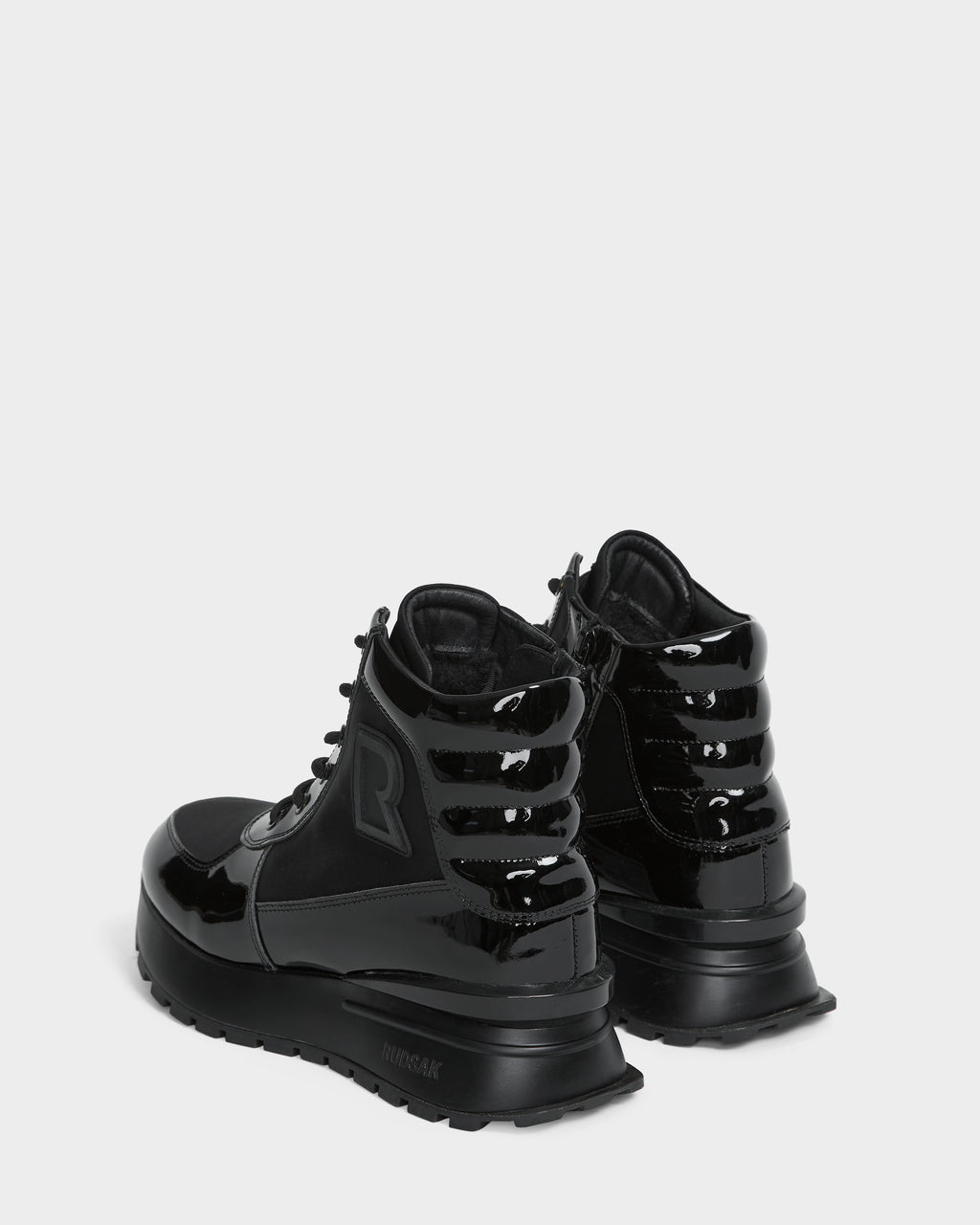 The Rudsak CHELSA - L224505 Black womens sneaker boots feature a waterproof zipper for easy wear—stylish, weather-resistant footwear for any occasion.