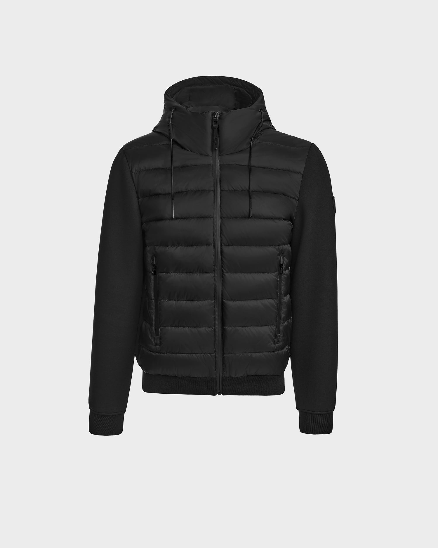 The Rudsak ELIAS - M124002 Black men’s quilted light jacket features a front zipper, ecofill padded front, ribbed cuffs and hem, and smooth fabric sleeves, shown on a plain light grey background.