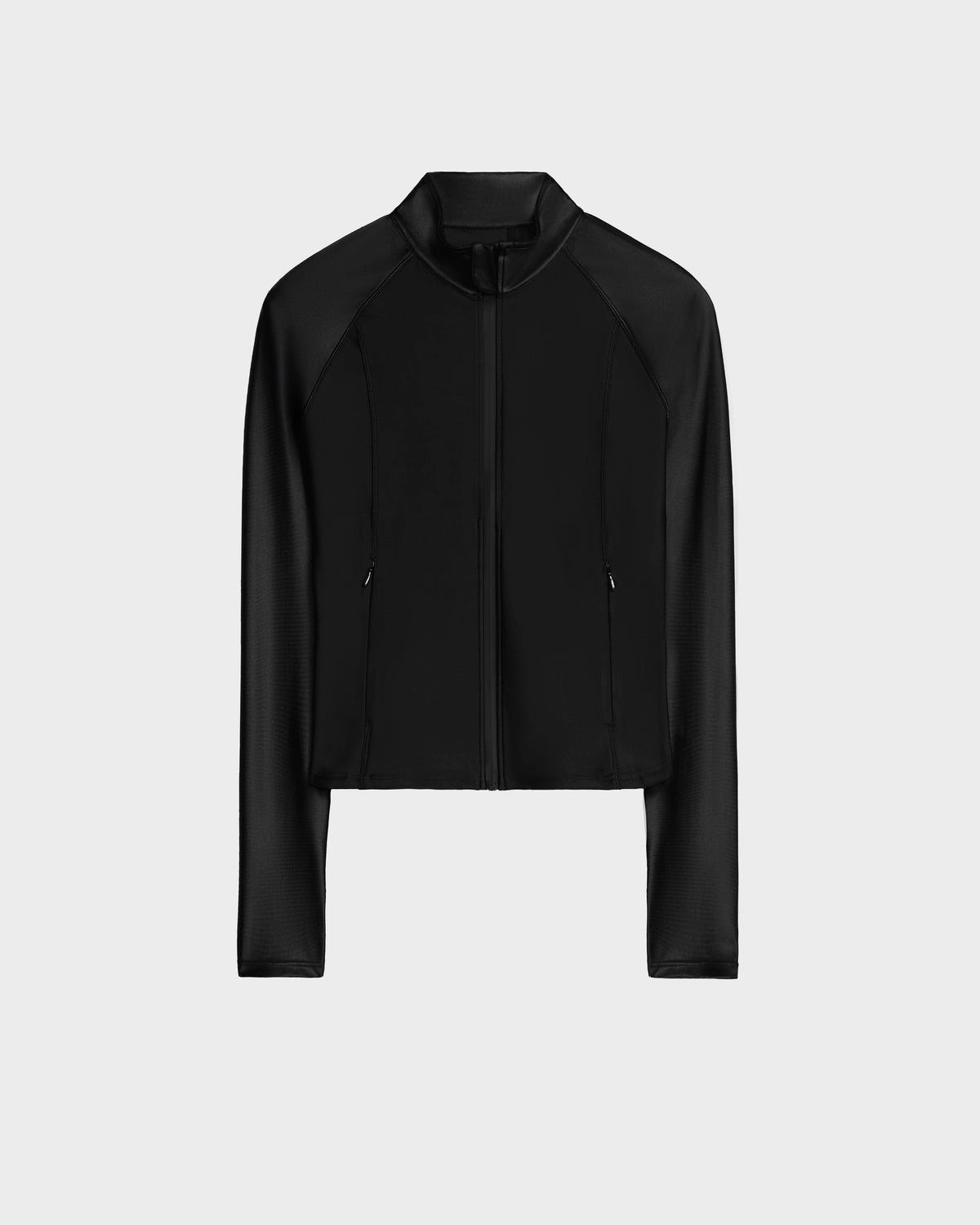 The Rudsak EVA - 8524514 Black is a women’s long-sleeve zip-up top with a high collar, fitted cropped design, and water-proof zipper, shown on a plain light gray background.