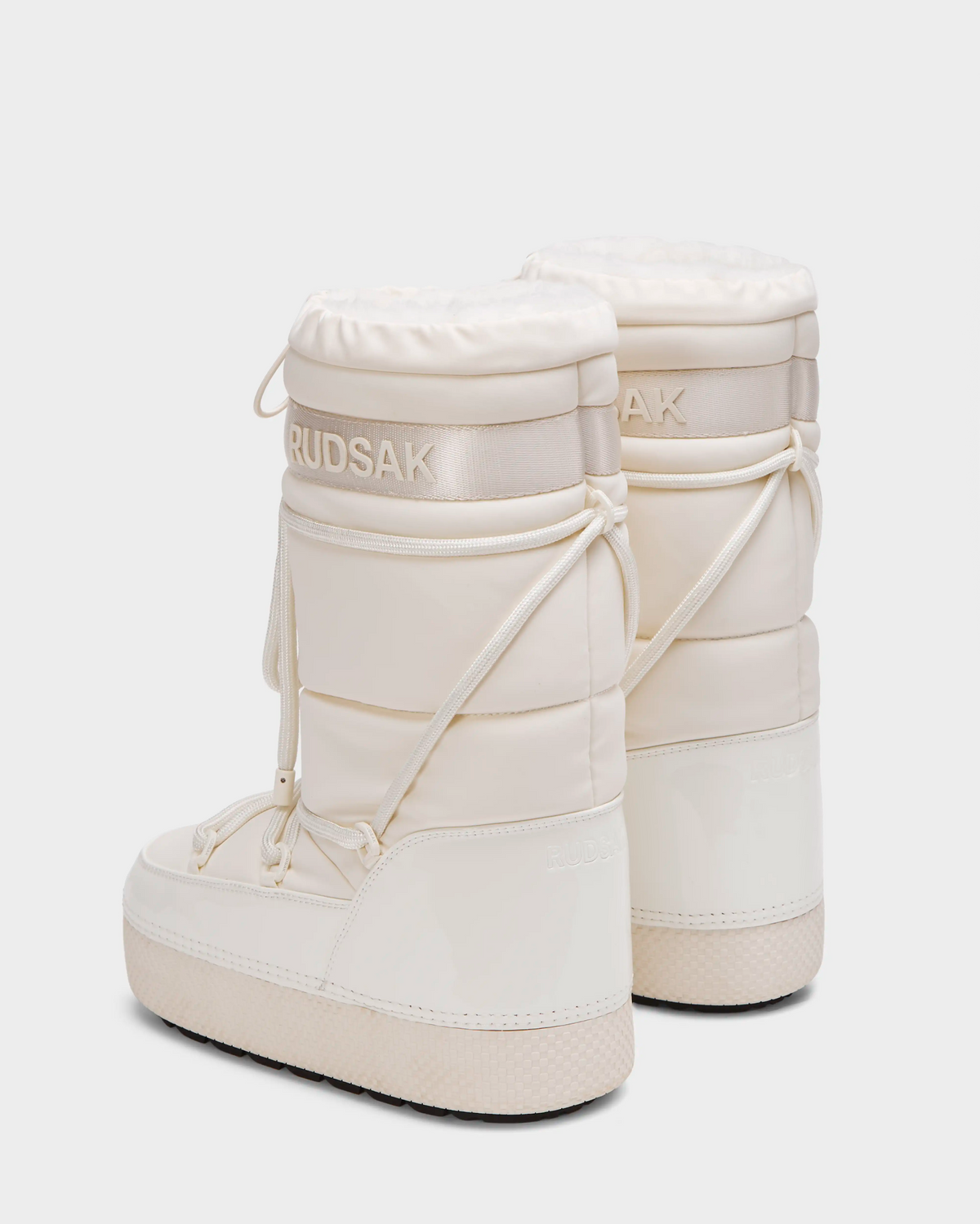 The Rudsak FARAH L - 8224542 Iceland women’s winter boots feature a white design with faux fur lining for added warmth and comfort.