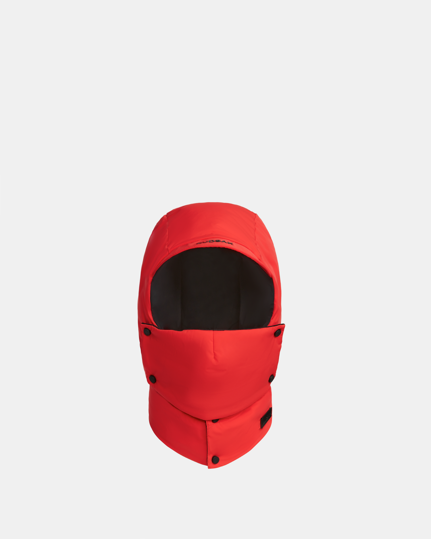 The Rudsak GREG - 9424519 Flame Red is a weather-resistant unisex balaclava with black lining and button closures, shown against a plain white background.
