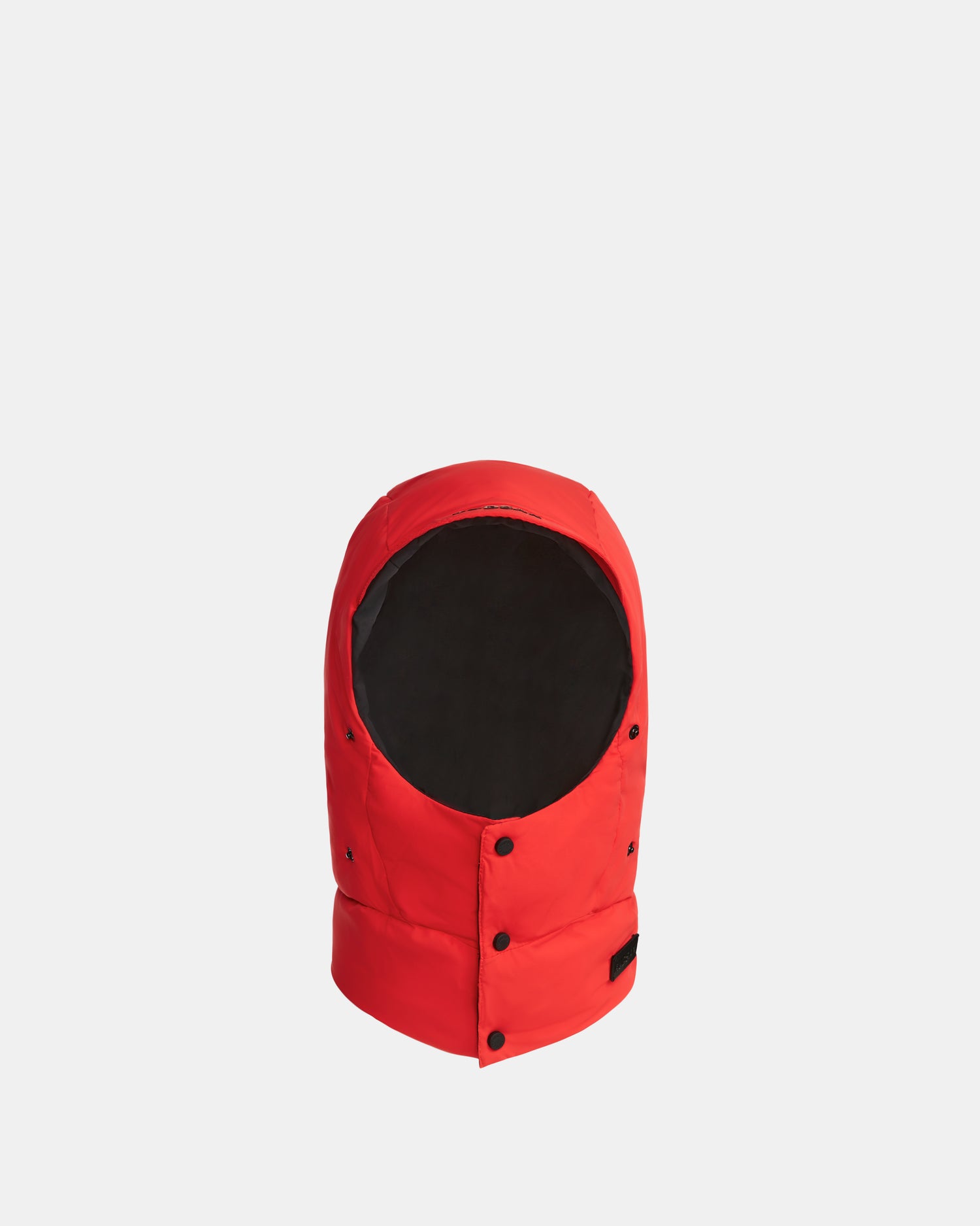 The GREG - 9424519 Flame Red hood by Rudsak is a bright red, weather-resistant winter accessory with black snap buttons and a dark inner lining, shown upright against a plain white background.