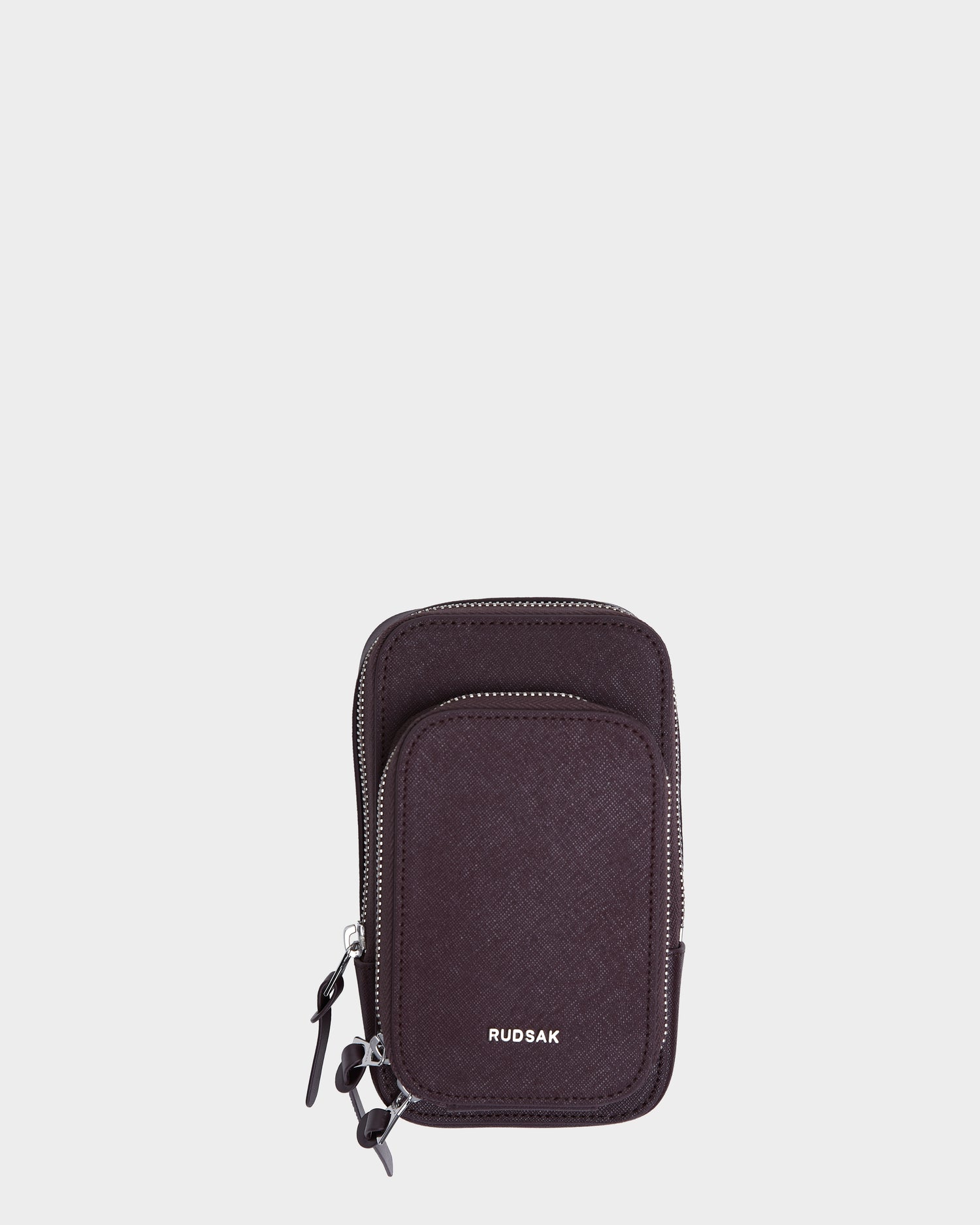 The Rudsak JIMIE - L324505 Wine is a small black zippered pouch with two compartments, silver zippers, and RUDSAK in white letters on the front, shown against a plain white background.