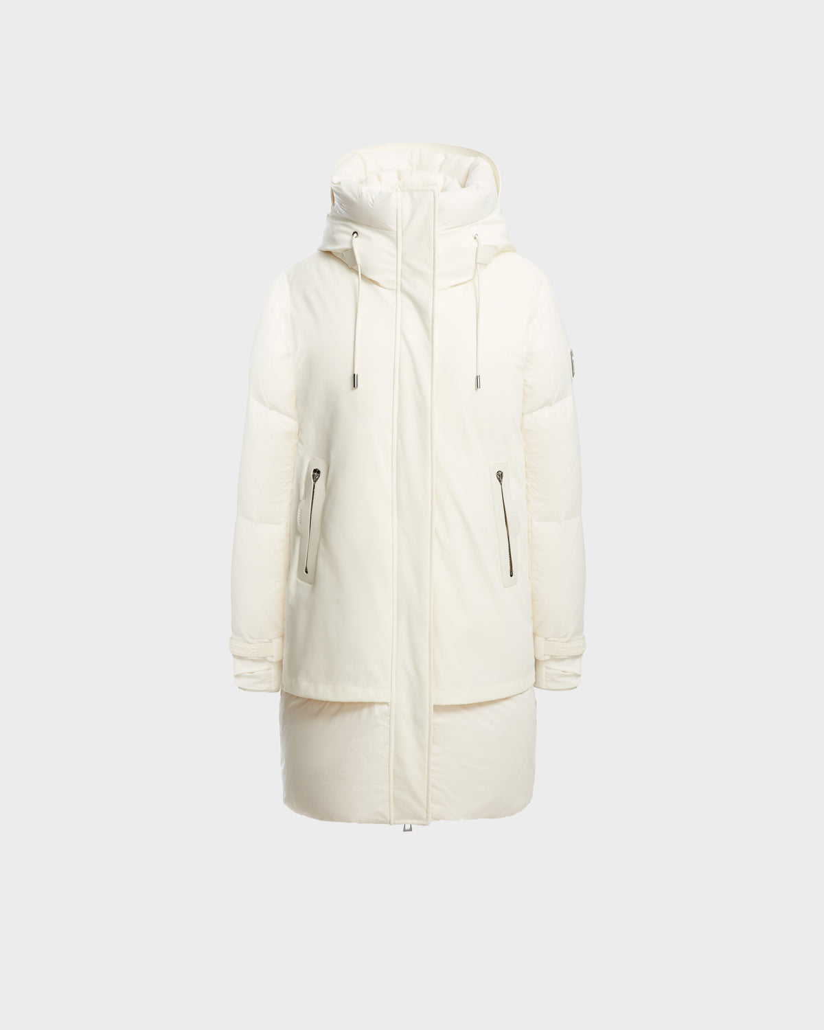 The Rudsak LAYAN - 8124576 Iceland is a long, white womens down parka with a hood, high collar, front zipper, drawstrings, and two vertical zippered side pockets for ultimate winter warmth.