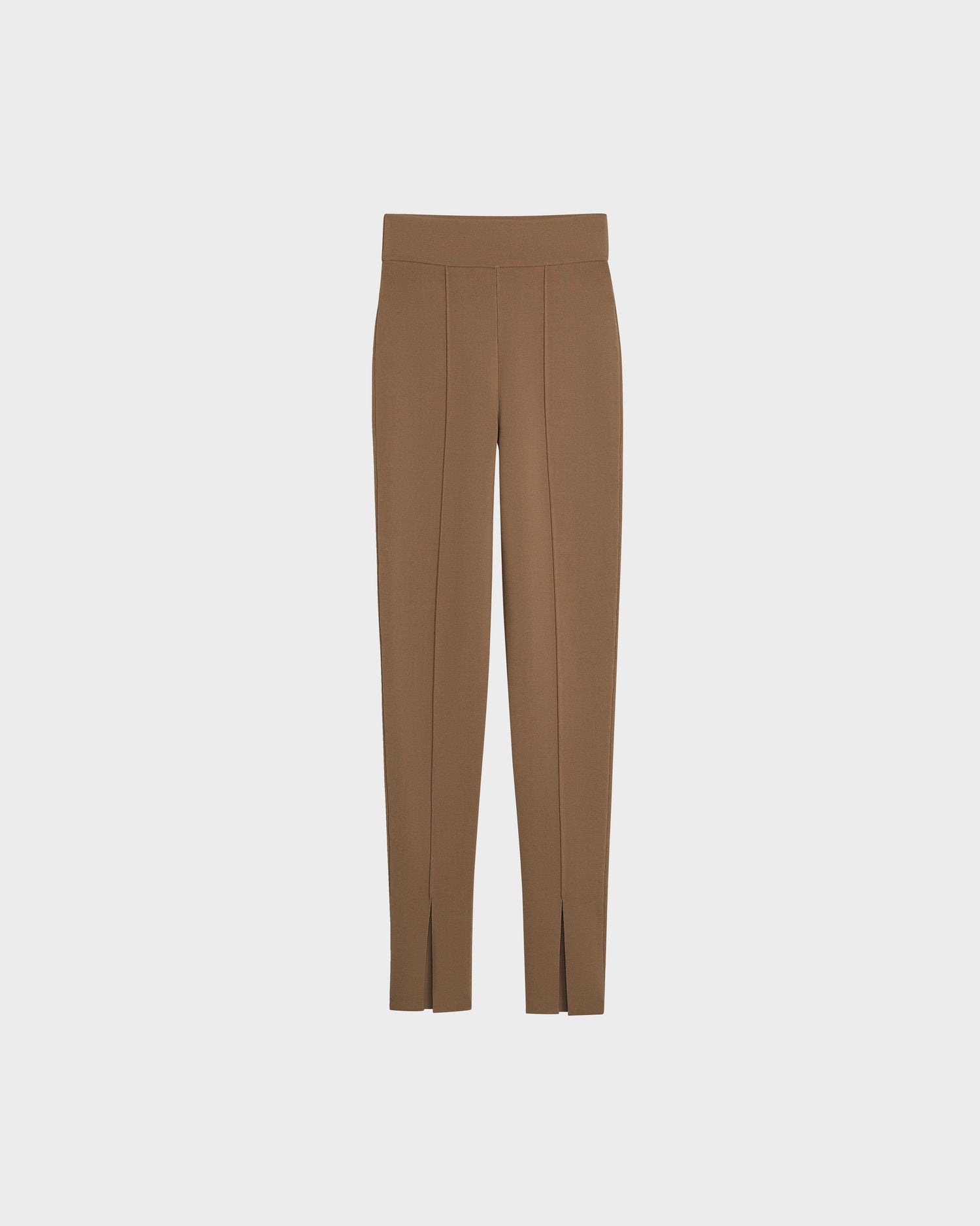 The MATHILDA - 8524515 Camel pants by Rudsak are high-waisted, brown tailored trousers with front center seams and small ankle slits, offering a sleek silhouette reminiscent of ankle slit leggings. Shown on a plain white background.