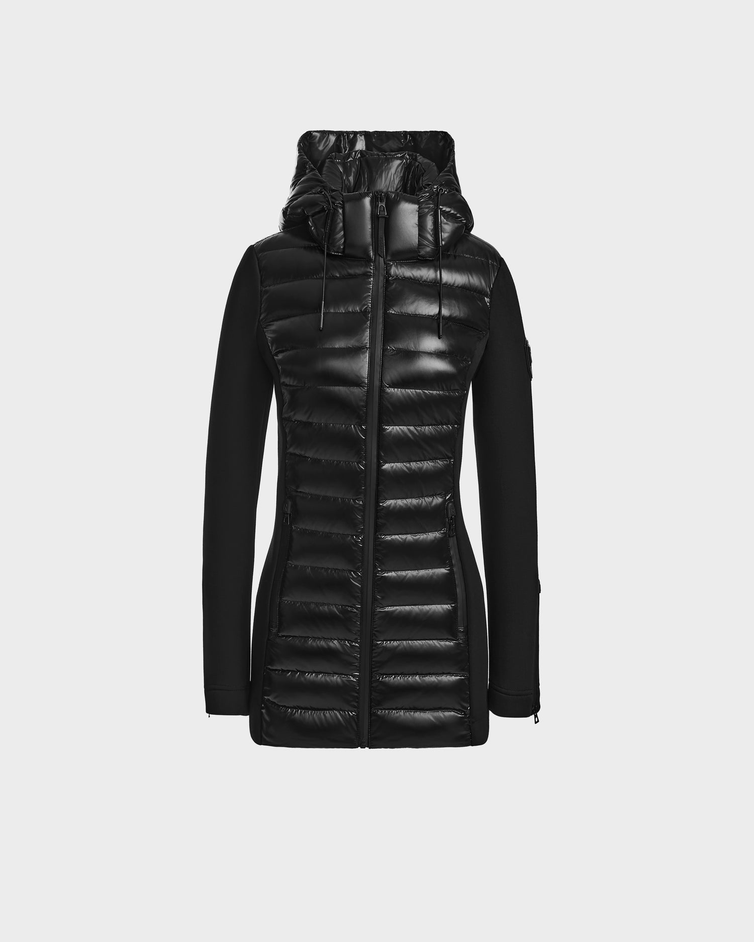 The MARRY - L121003 BLACK by Rudsak is a fitted women’s puffer jacket with shiny front and hood, matte sides and sleeves, zip closure, made from recycled down for a modern activewear look.