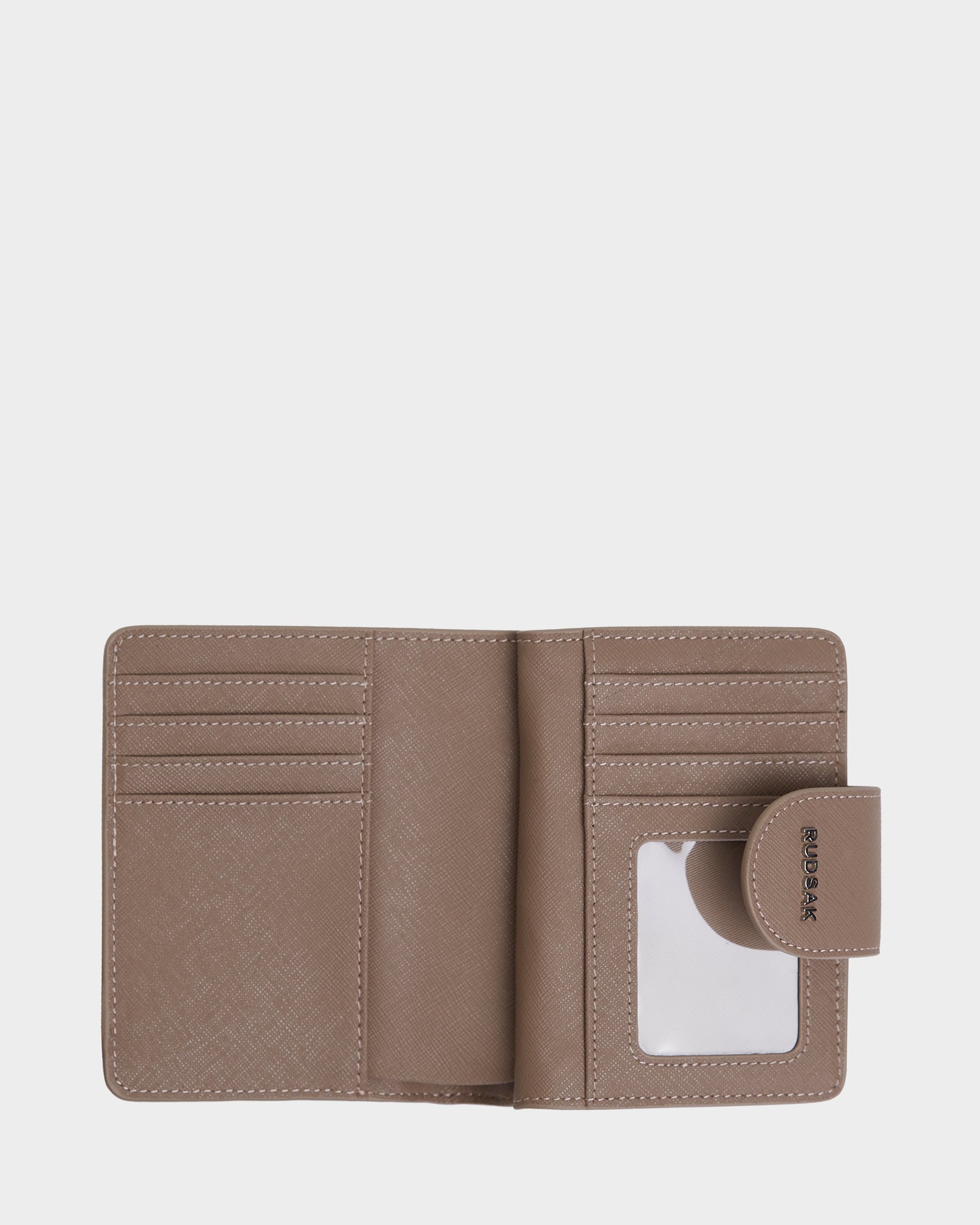 The Rudsak NOVALIE - L424500 Sand womens cardholder wallet in brown leather is open, revealing multiple card slots, a transparent ID window, and a right-side snap closure against a plain white background.