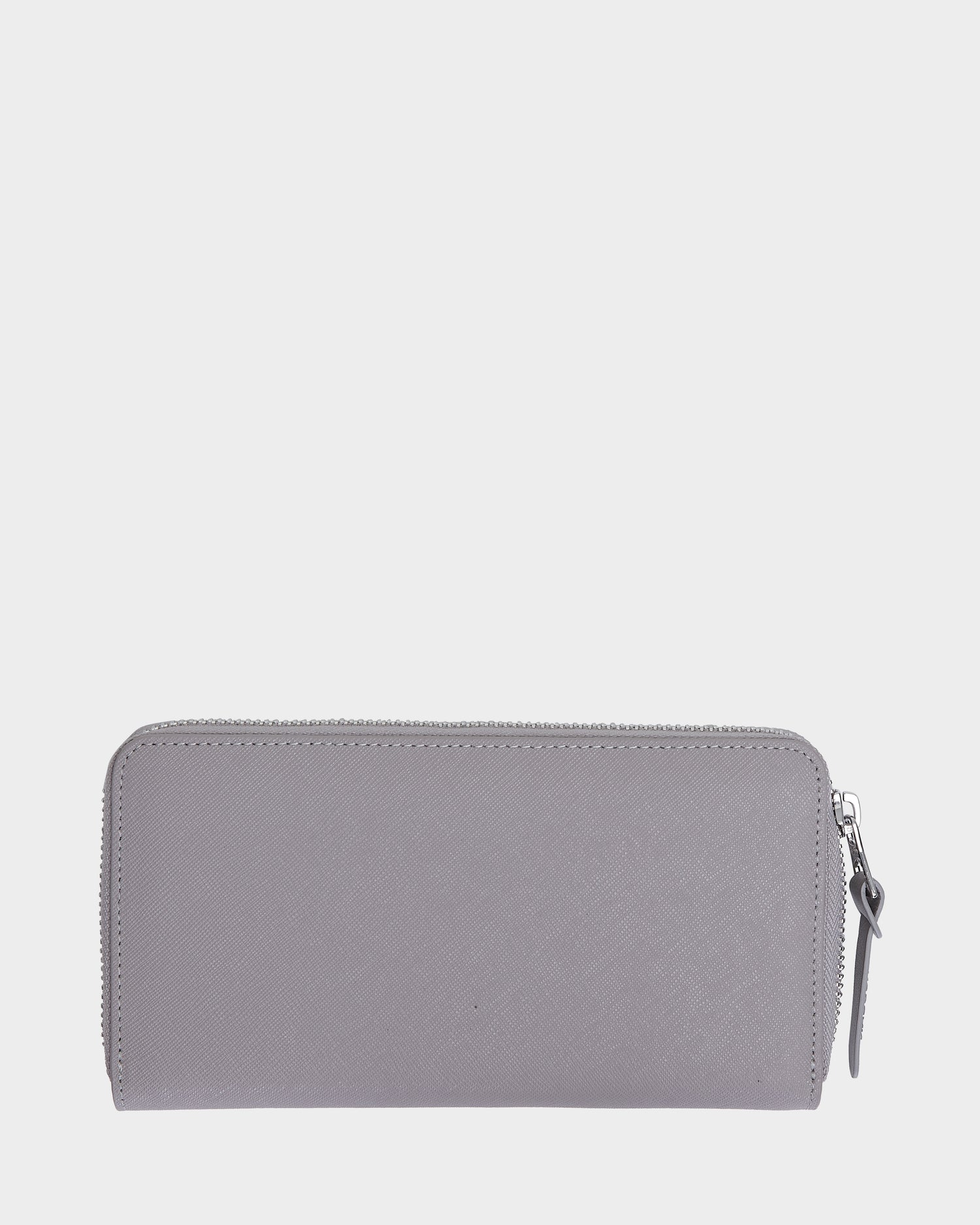 The Rudsak NYLA - L424502 Grey womens leather wallet features a textured surface, three-sided zipper with pull tab, zippered compartment, and cardholder slots, shown against a plain light background.
