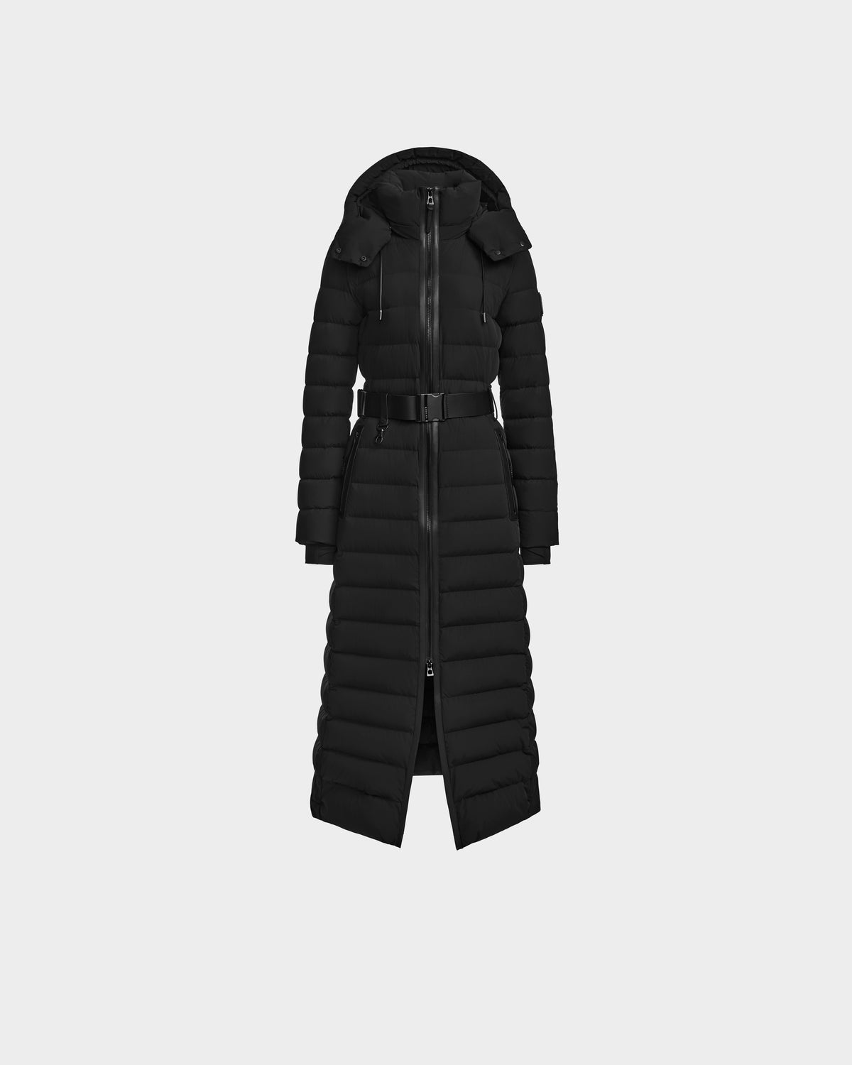 The Rudsak PELIN L - 8124815 Black is a women’s long down puffer winter coat with a hood, front zipper, belted waist, and horizontal quilted stitching, made with RDS-certified down. Shown on a plain white background.