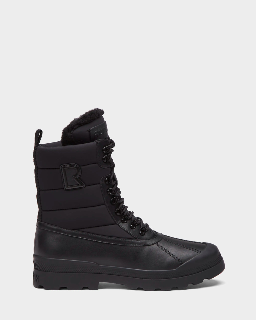 Rudsak REAGAN - 6225046 Black winter boots featuring a quilted shaft, shearling lining, and a rugged lug sole.