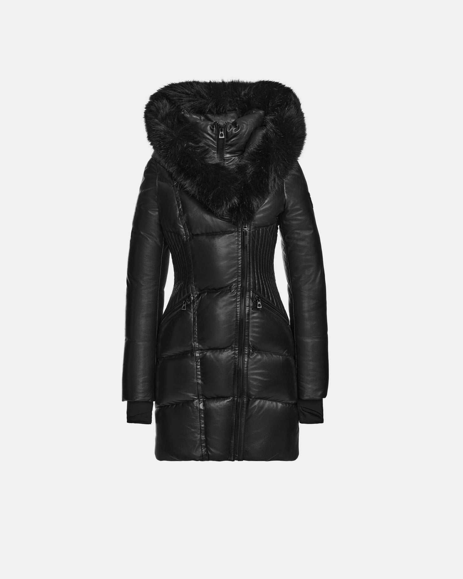 The SHAUNA X - 8122535 BLACK by Rudsak is a long black women’s puffer coat with a fitted waist, zippered front, and large faux fur-trimmed hood, shown on a plain white background.