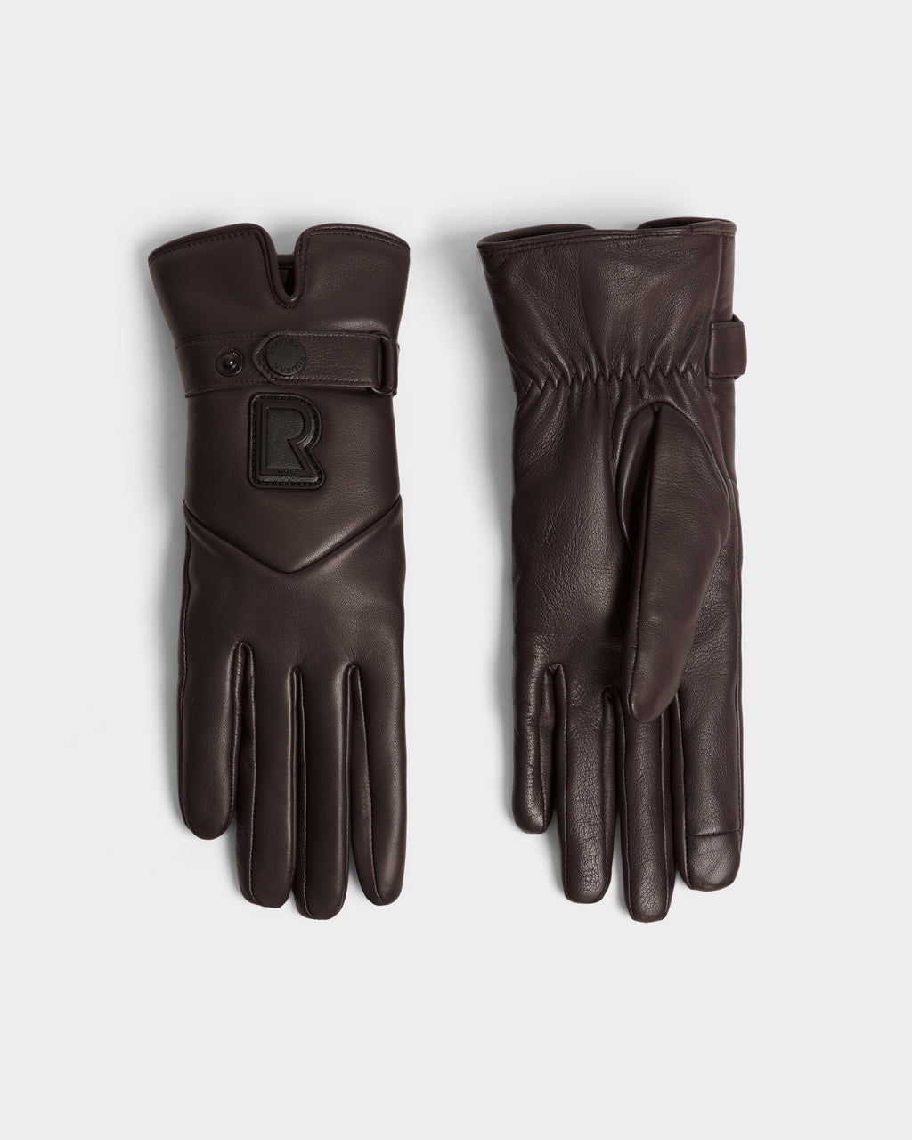 The Rudsak STROMBOLI - 8424510 Espresso gloves feature dark brown leather and cashmere, one showing a gathered palm and the other a snap strap with a raised R logo—stylish womens winter gloves for chilly days.