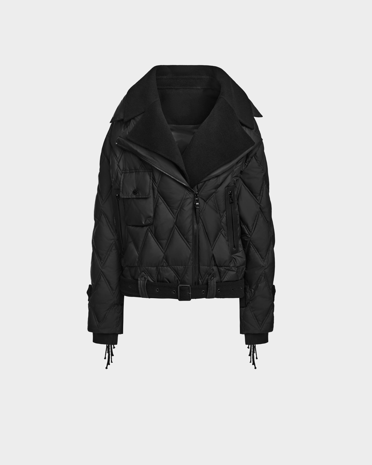 The Rudsak ZOLA - 8124712 Black is a women’s quilted down biker jacket with a wide collar, waist belt, front zipper, chest flap pocket, and zippered sleeve cuffs, shown on a plain light gray background.