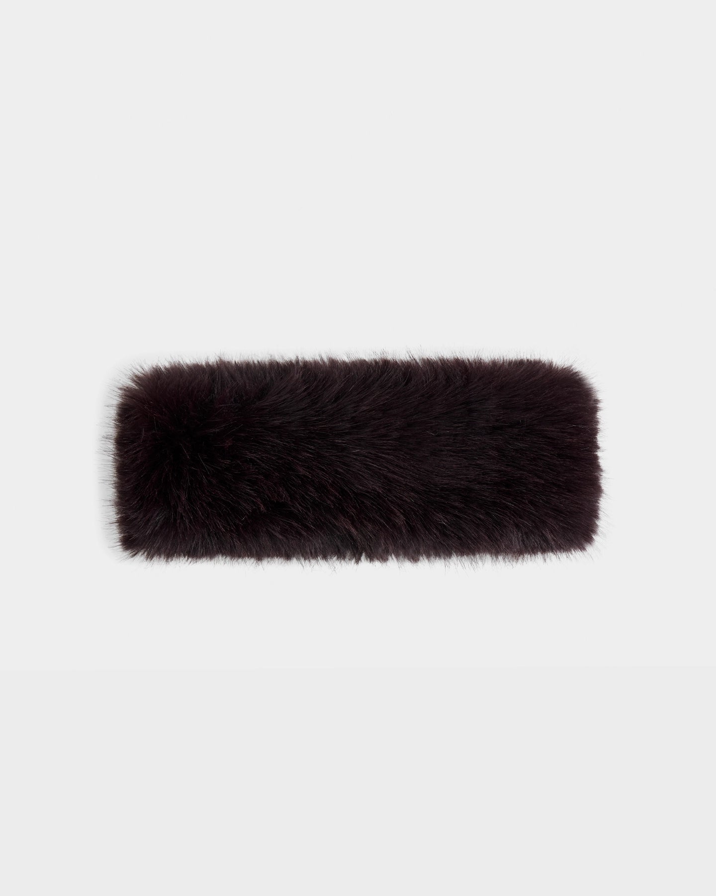 The ARLETTE - 8425544 Bordeaux by Rudsak is a rectangular women’s faux fur headband in dark brown, displayed flat on a white background—perfect for adding cozy-chic style to your winter wardrobe.