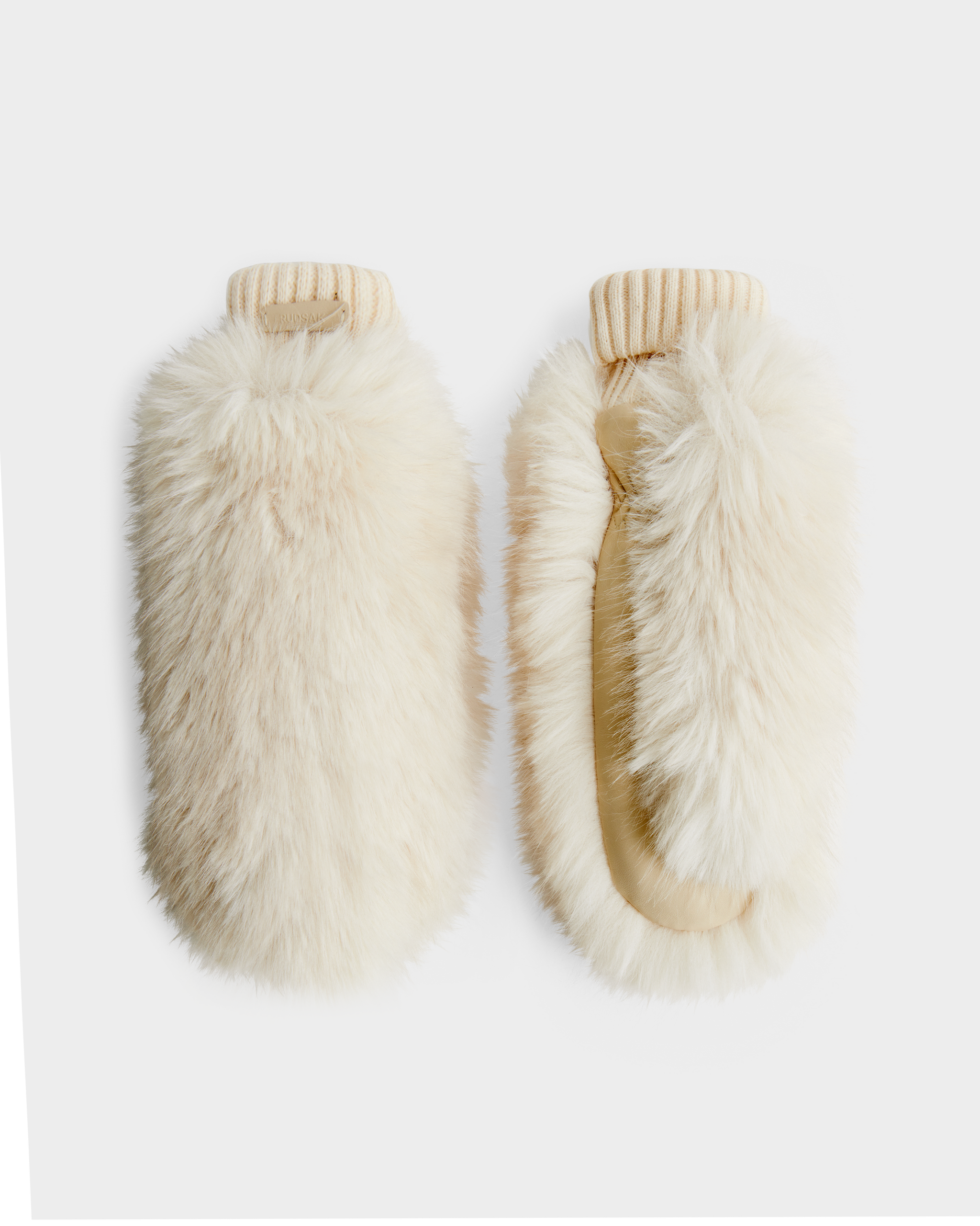 A pair of BELLA - 8425006 Vanilla mittens by Rudsak, featuring fluffy cream-colored faux fur and ribbed knit cuffs, displayed side by side on a plain white background.