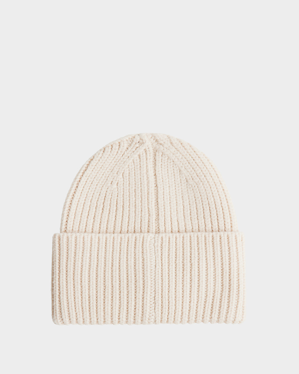 The Rudsak COLIN - 9424518 Vanilla is a cream-colored unisex ribbed knit beanie with a folded brim, shown on a plain white background.