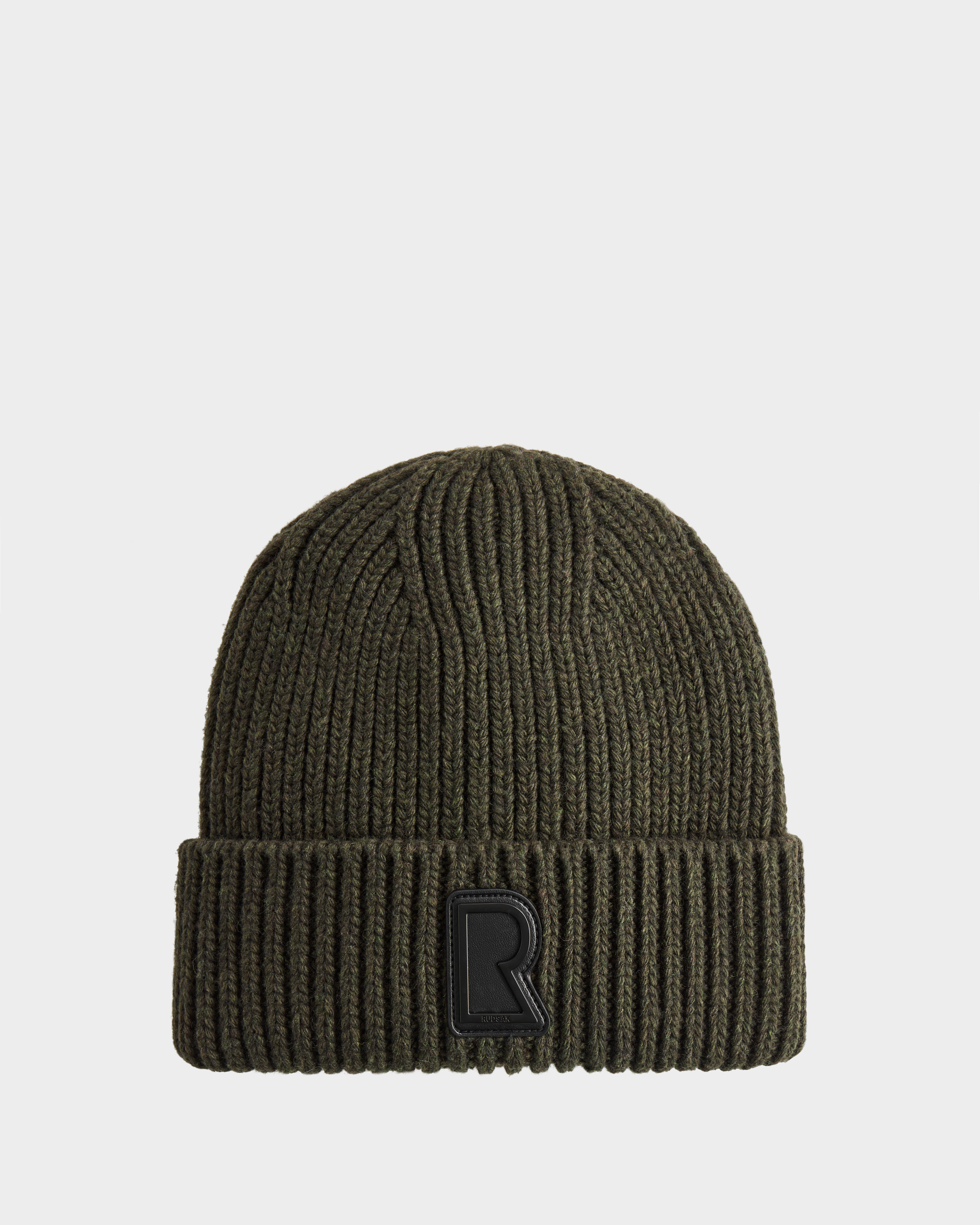 The CYBELLE - 9424504 Dark Olive by Rudsak is a ribbed, olive green wool blend beanie with a folded brim and front black 'R' patch—this unisex knit hat is a stylish winter accessory shown on a plain white background.