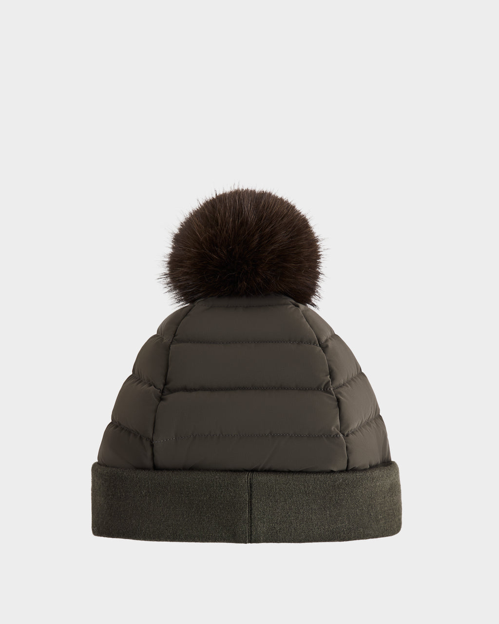 The Rudsak GALA - 8424514 Dark Olive is a women’s quilted down puffer hat with a folded brim and a large, removable faux fur pom pom, shown against a plain white background.