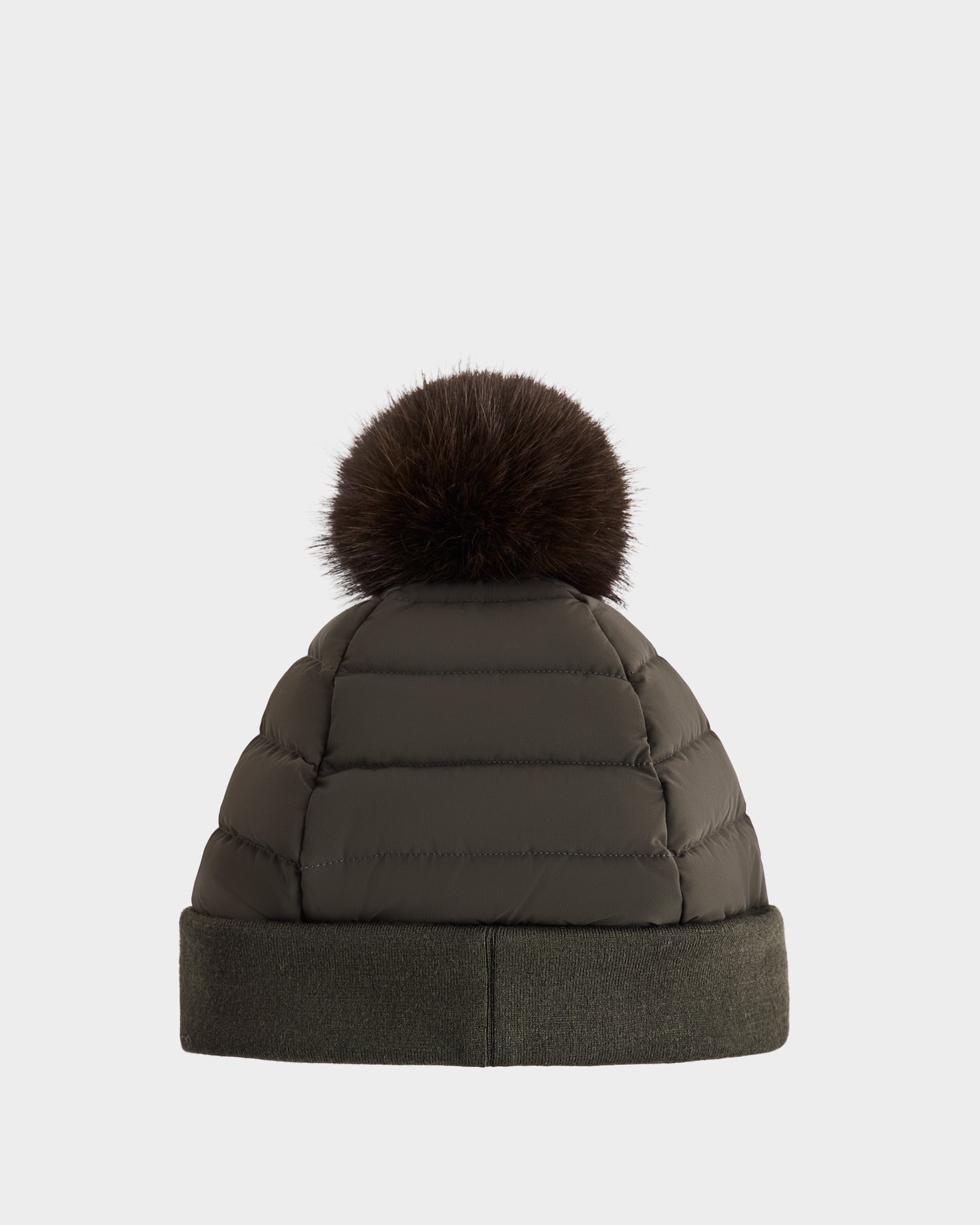 The Rudsak GALA - 8424514 Dark Olive is a women’s quilted down puffer hat with a folded brim and a large, removable faux fur pom pom, shown against a plain white background.