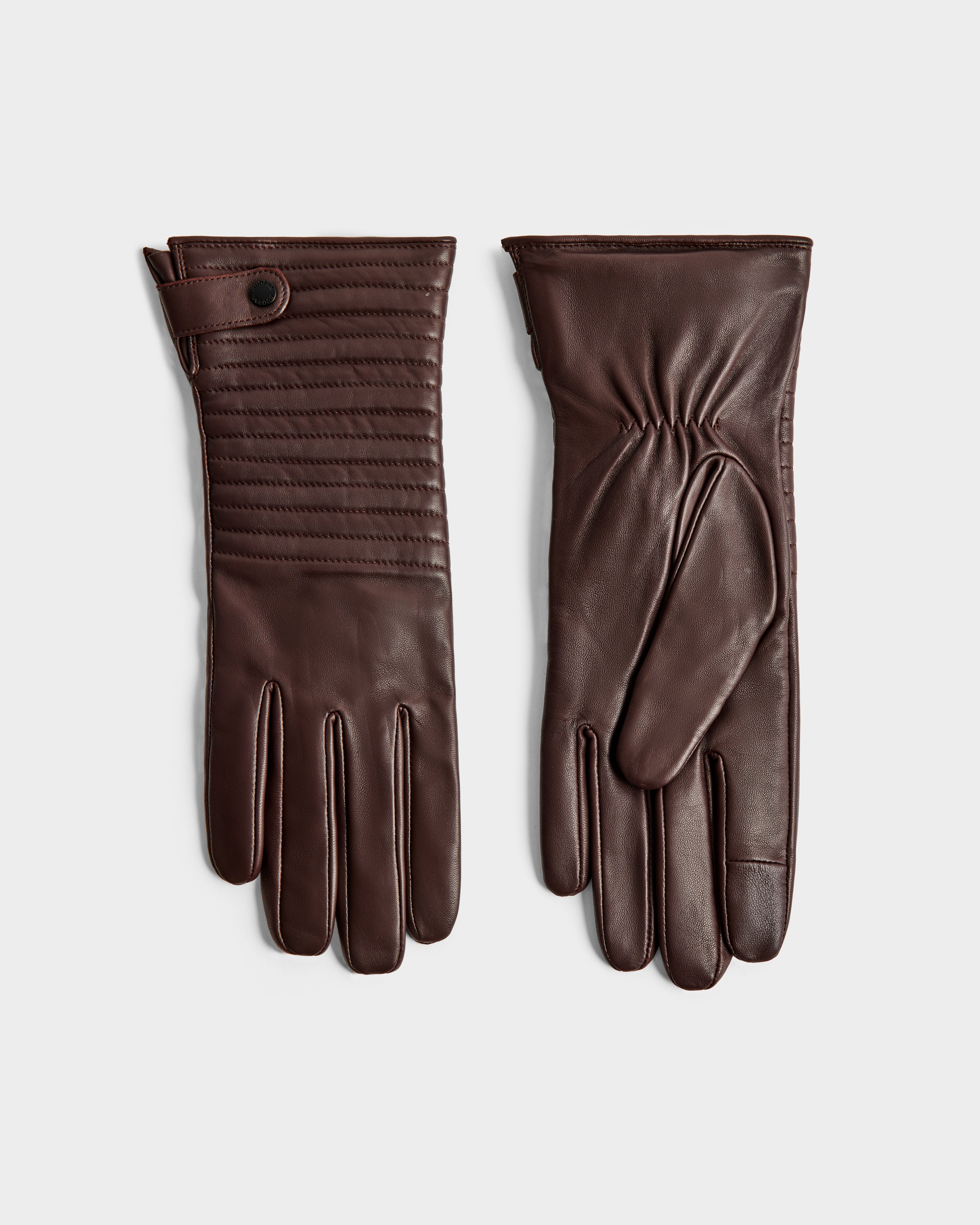 Rudsak’s GEMMA - 8425008 Espresso gloves feature brown leather, a snap button strap, stitched detailing, and gathered wrists—perfect winter accessories for keeping stylish and warm.