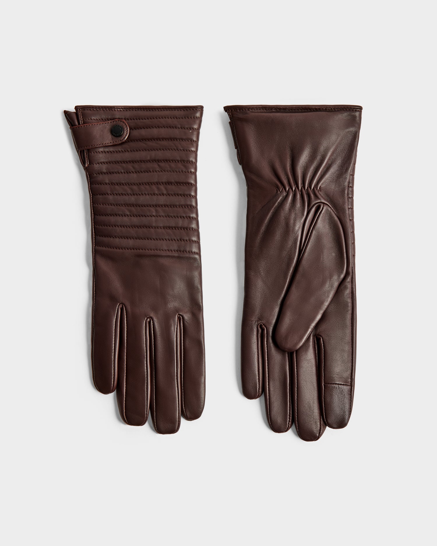 Rudsak’s GEMMA - 8425008 Espresso gloves feature brown leather, a snap button strap, stitched detailing, and gathered wrists—perfect winter accessories for keeping stylish and warm.