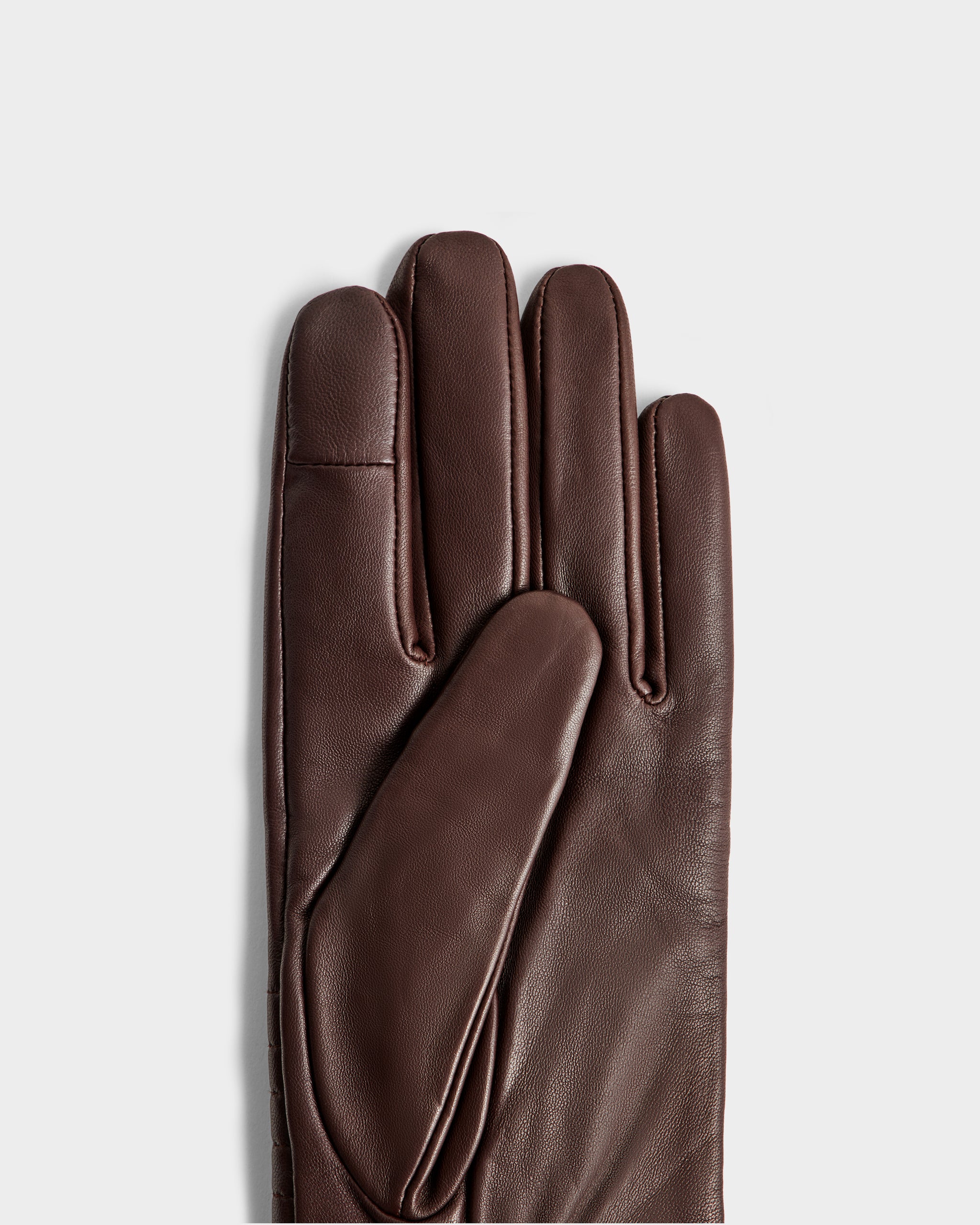 The Rudsak GEMMA - 8425008 Espresso glove, an essential winter accessory, is displayed palm side up with all fingers visible against a plain light gray background.