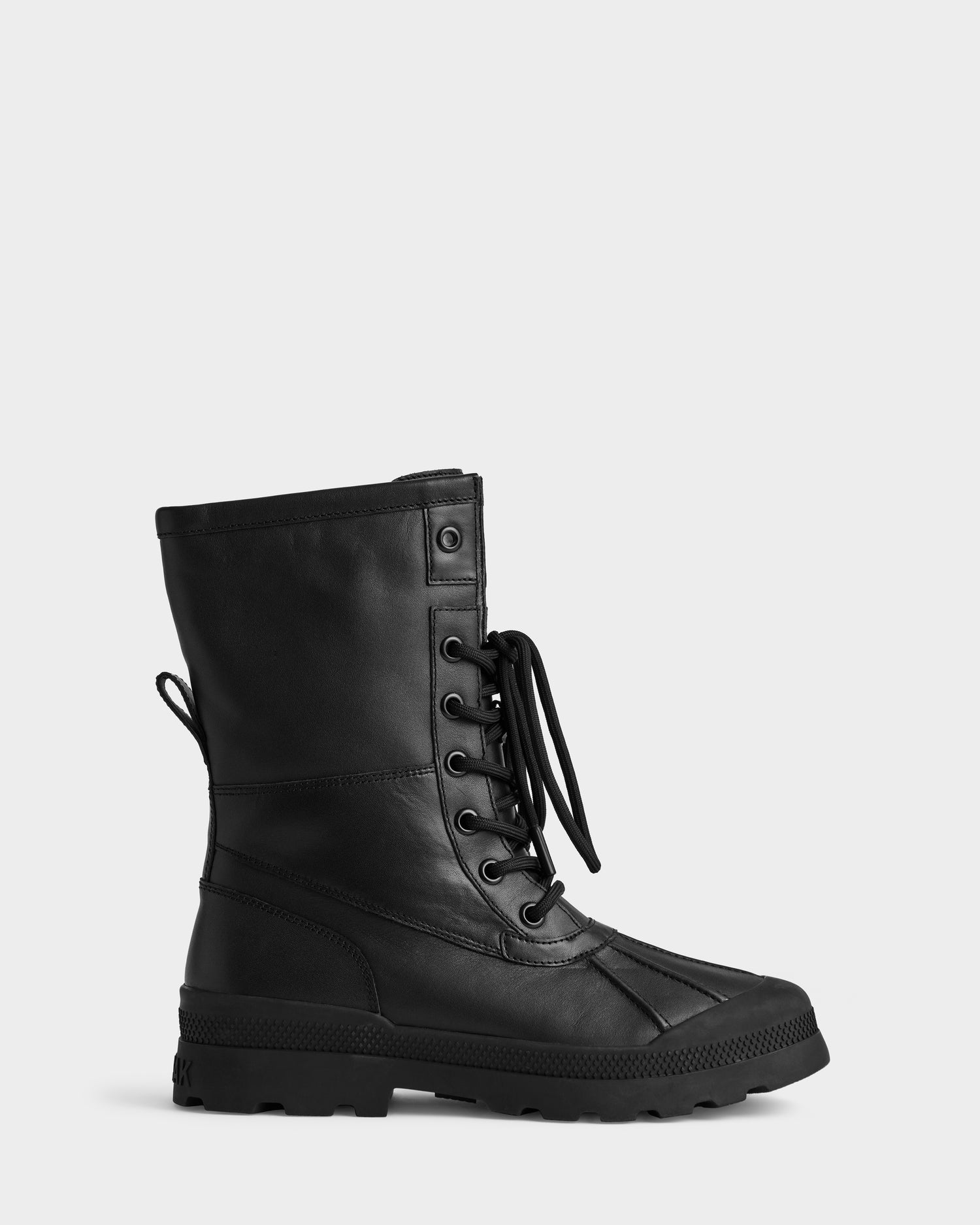 The JESI - 8225026 Black boot by Rudsak features a rugged sole, lace-up front, side stitching, and a pull tab at the back, displayed side profile against a plain white background.